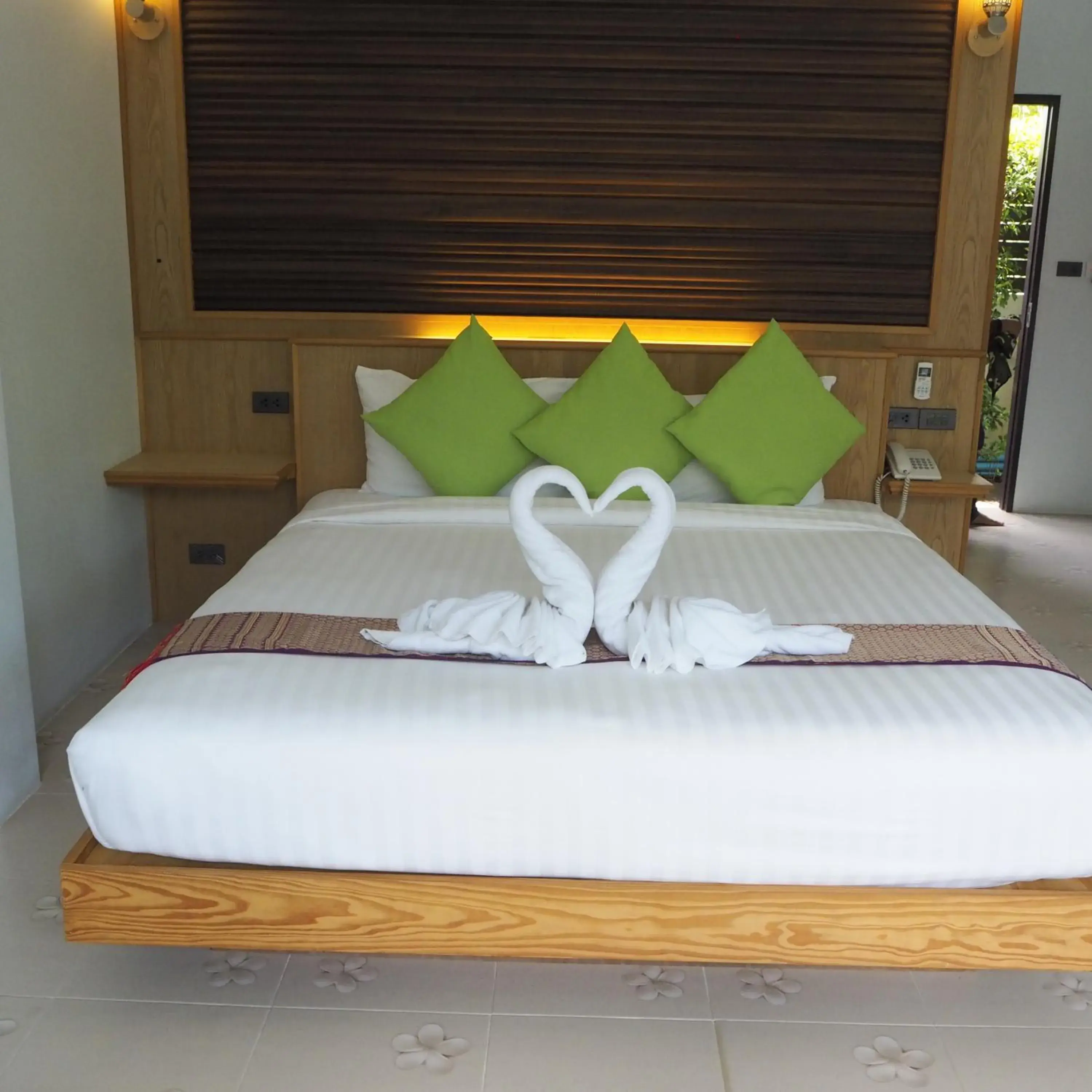 Bed in Jasmine Resort And Spa Bed in Jasmine Resort And Spa