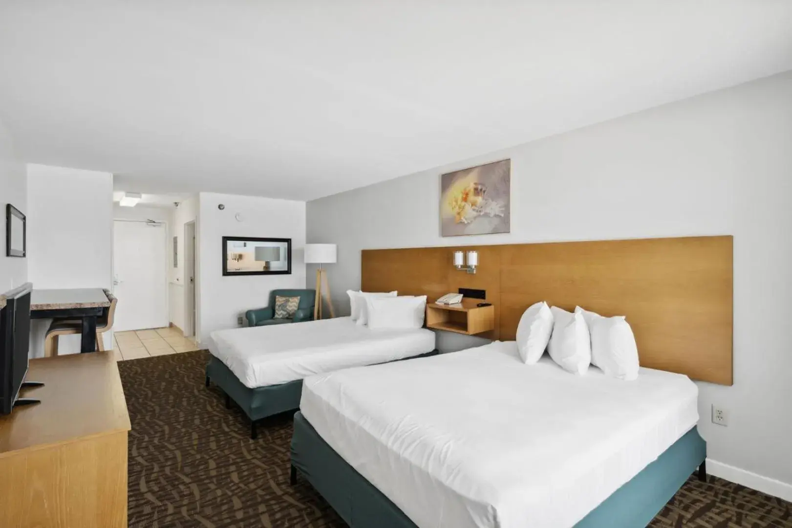 Bed in Beach Tower Beachfront Hotel, a By The Sea Resort Bed in Beach Tower Beachfront Hotel, a By The Sea Resort