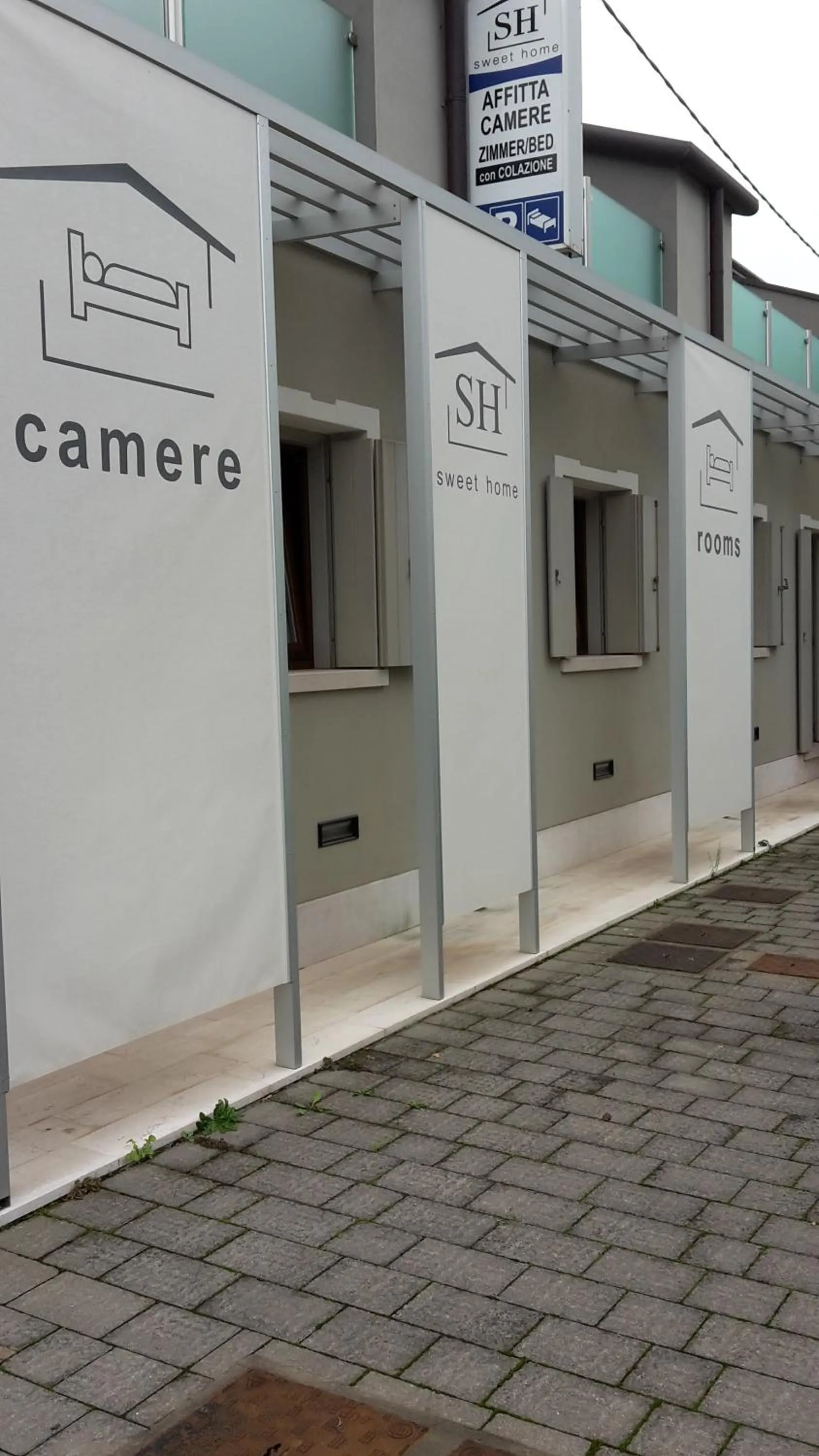 Property logo or sign in Sweet Home