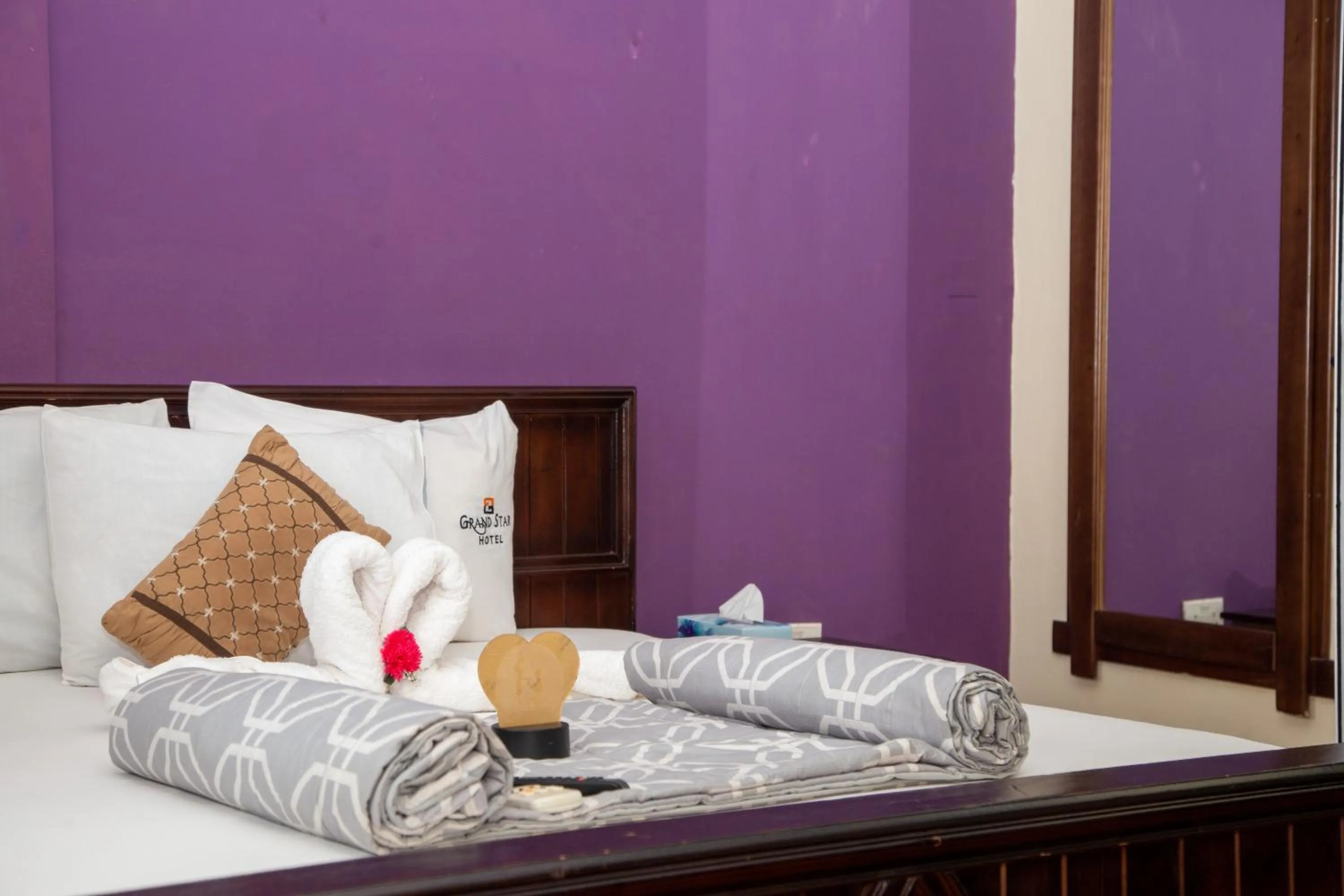 Bed in Grand Star Hotel