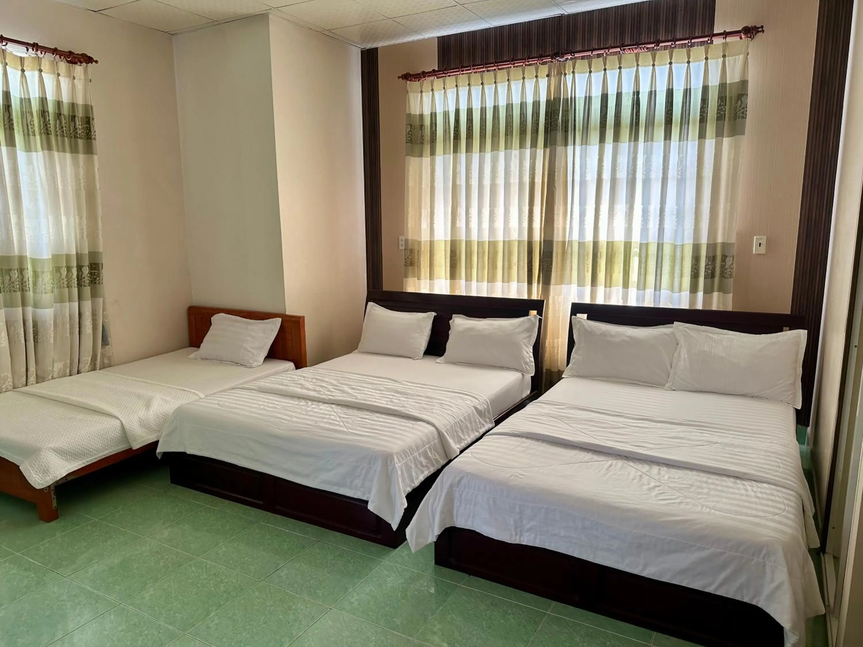 Bed in Thanh Cong Hotel