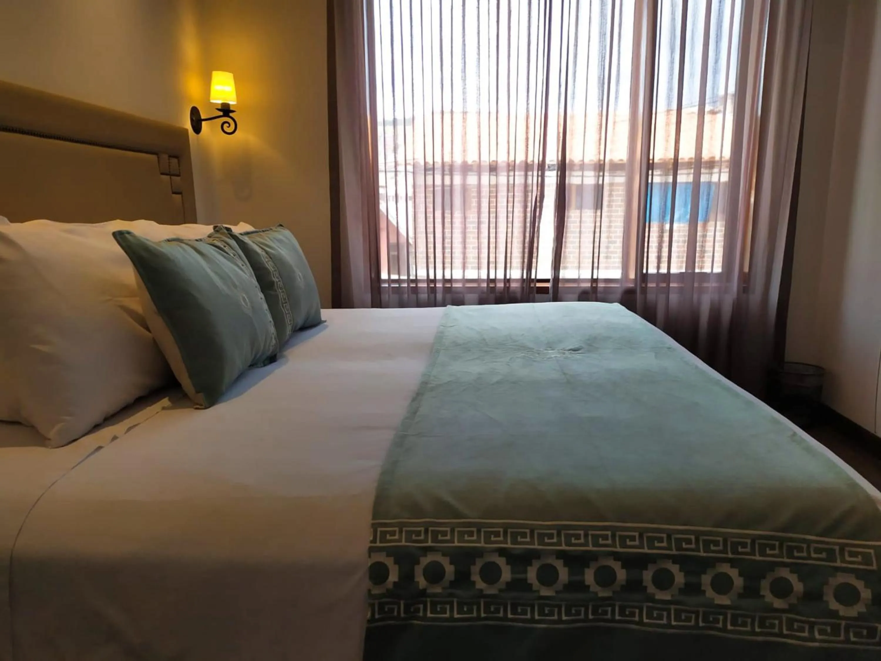 Bed in Casa Esmeralda by Katari