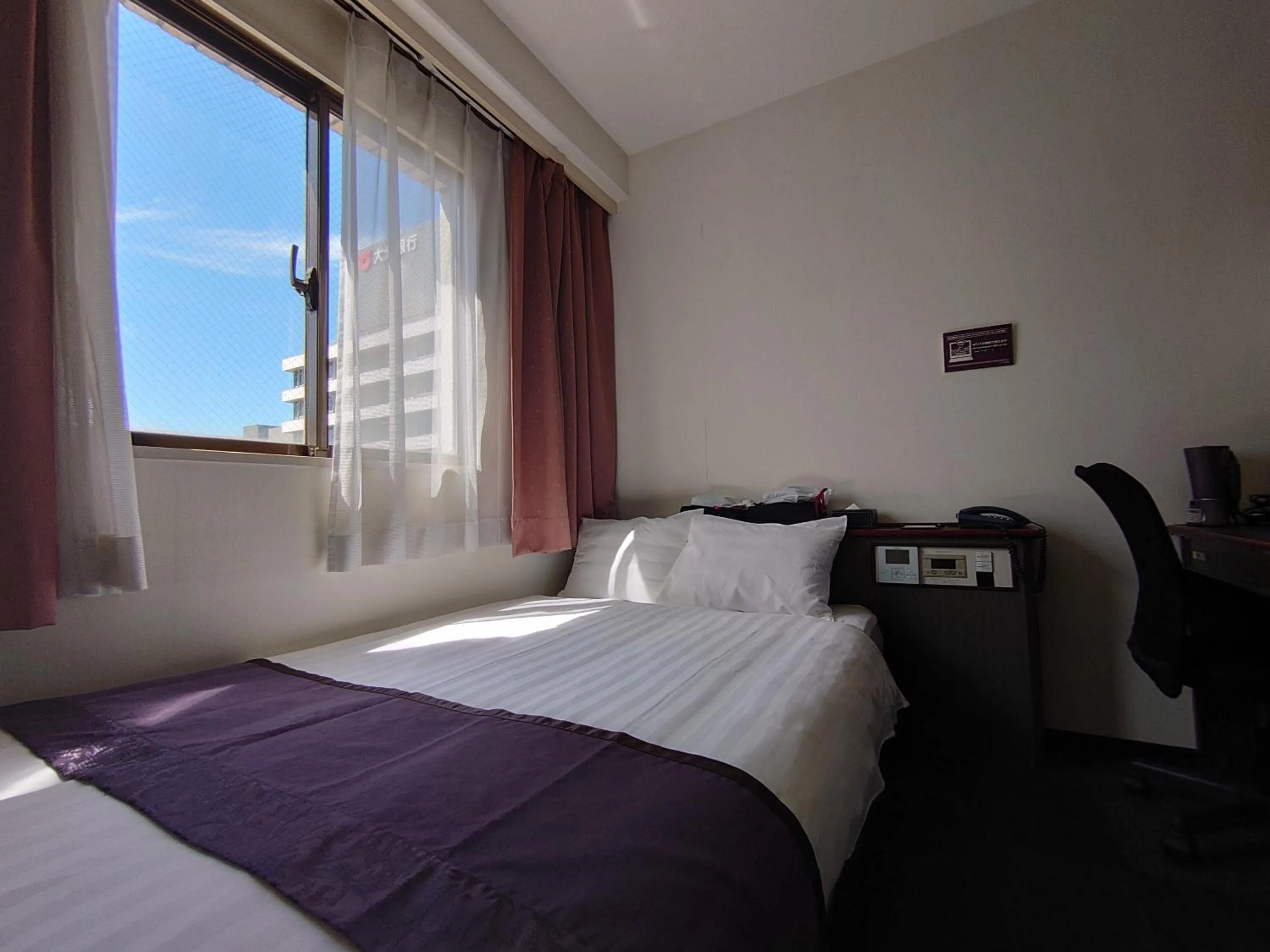 Bed in Hotel Area One Oita