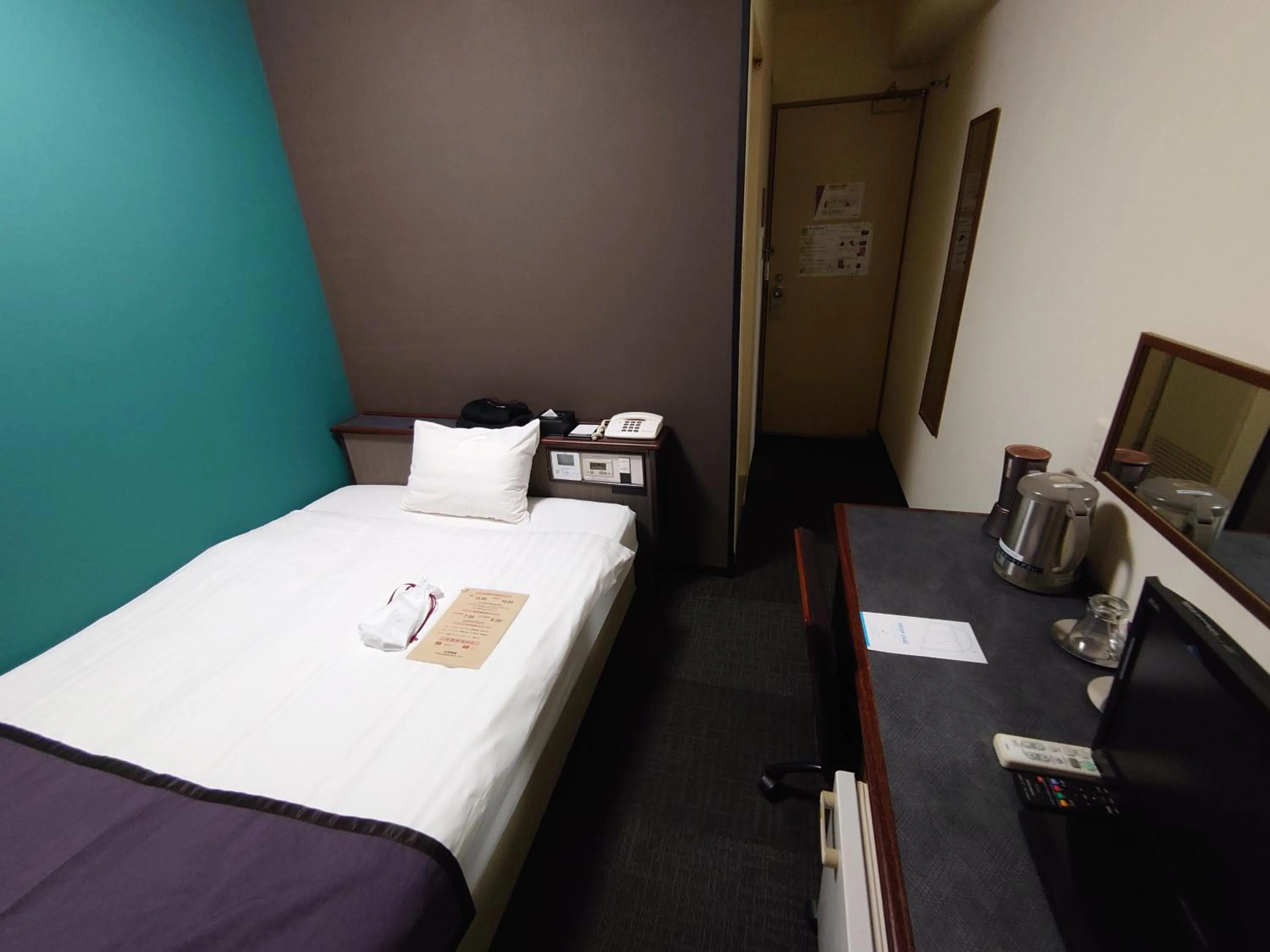 Bed in Hotel Area One Oita