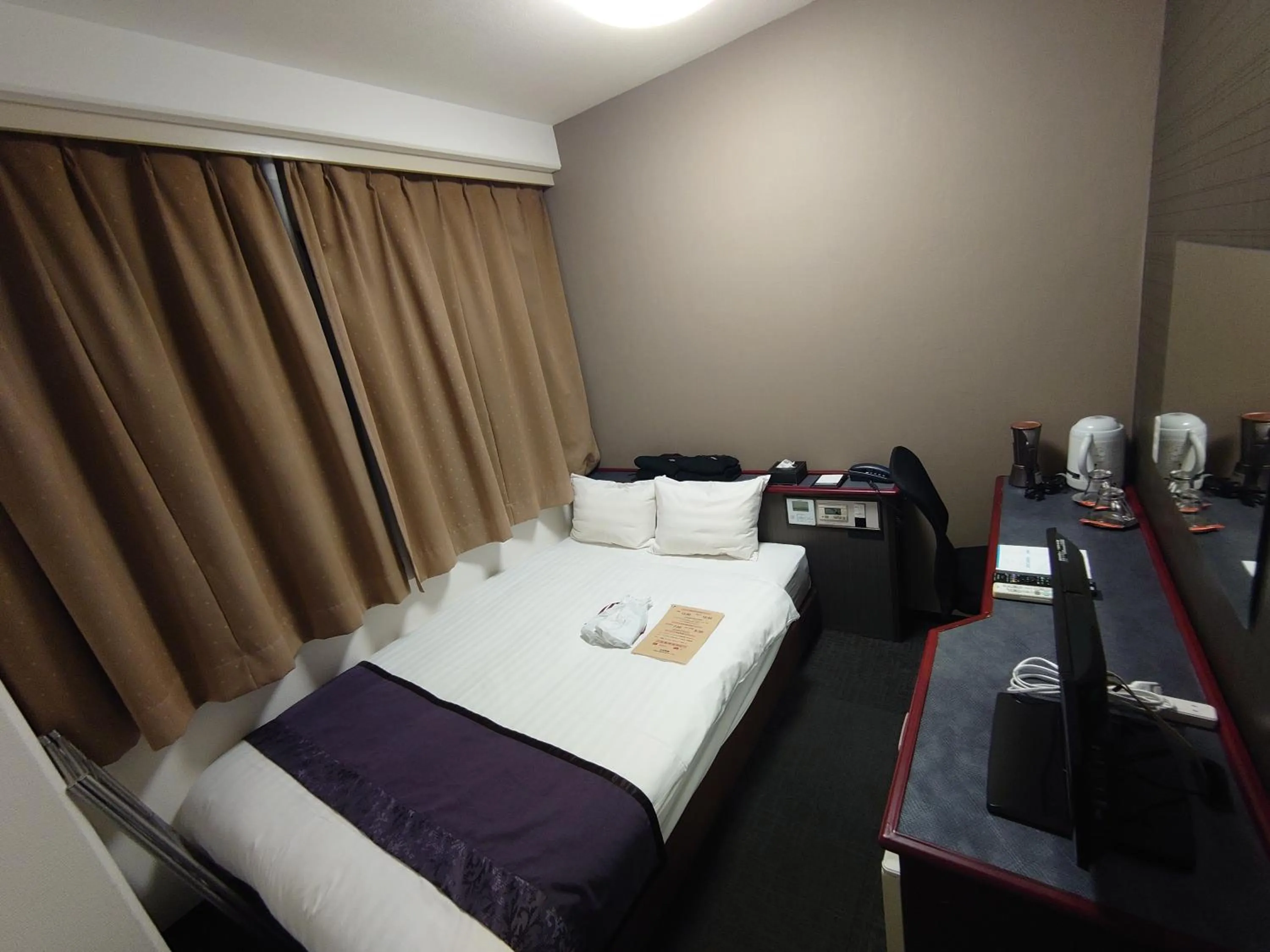 Bed in Hotel Area One Oita
