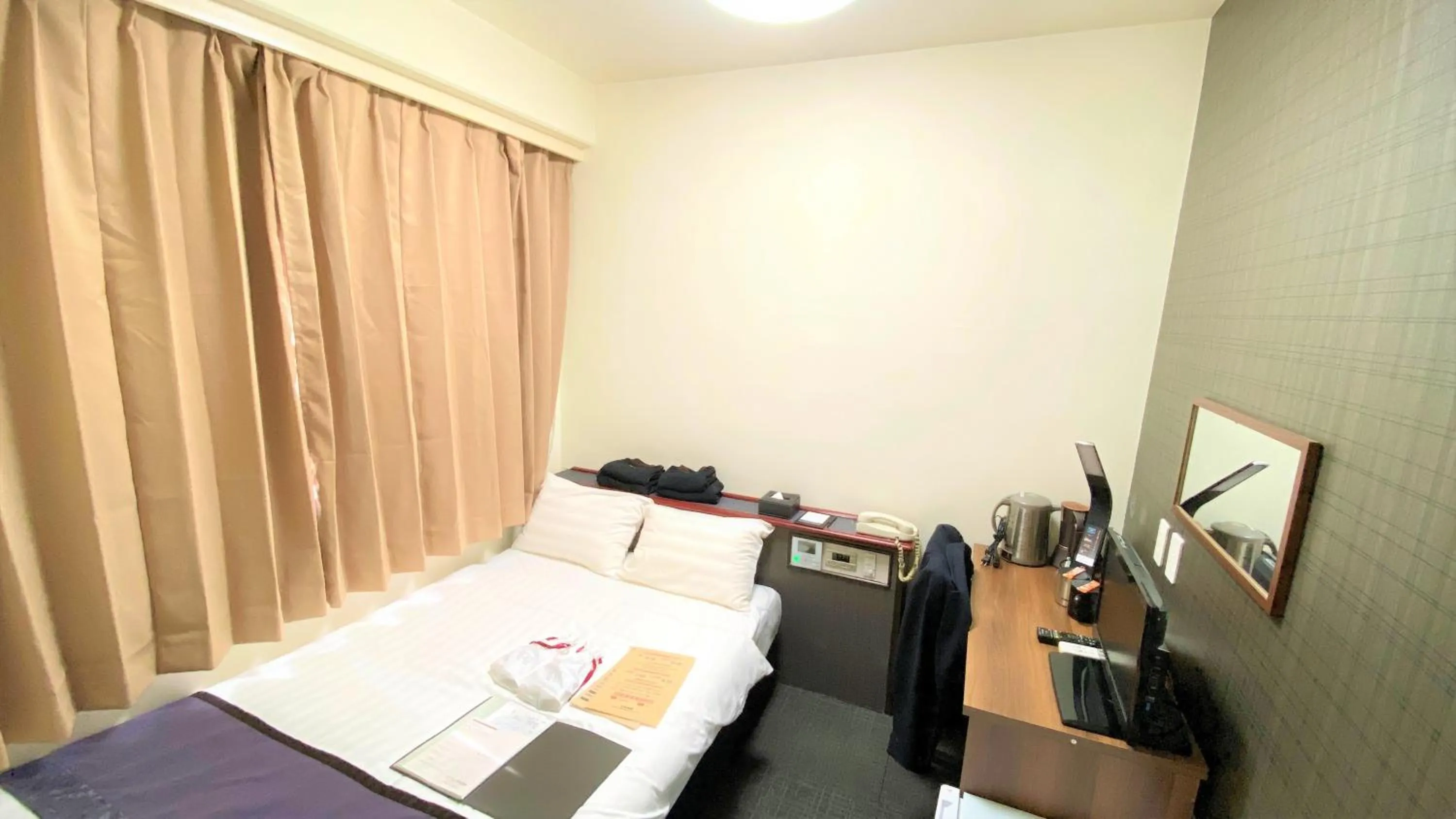 Bed in Hotel Area One Oita