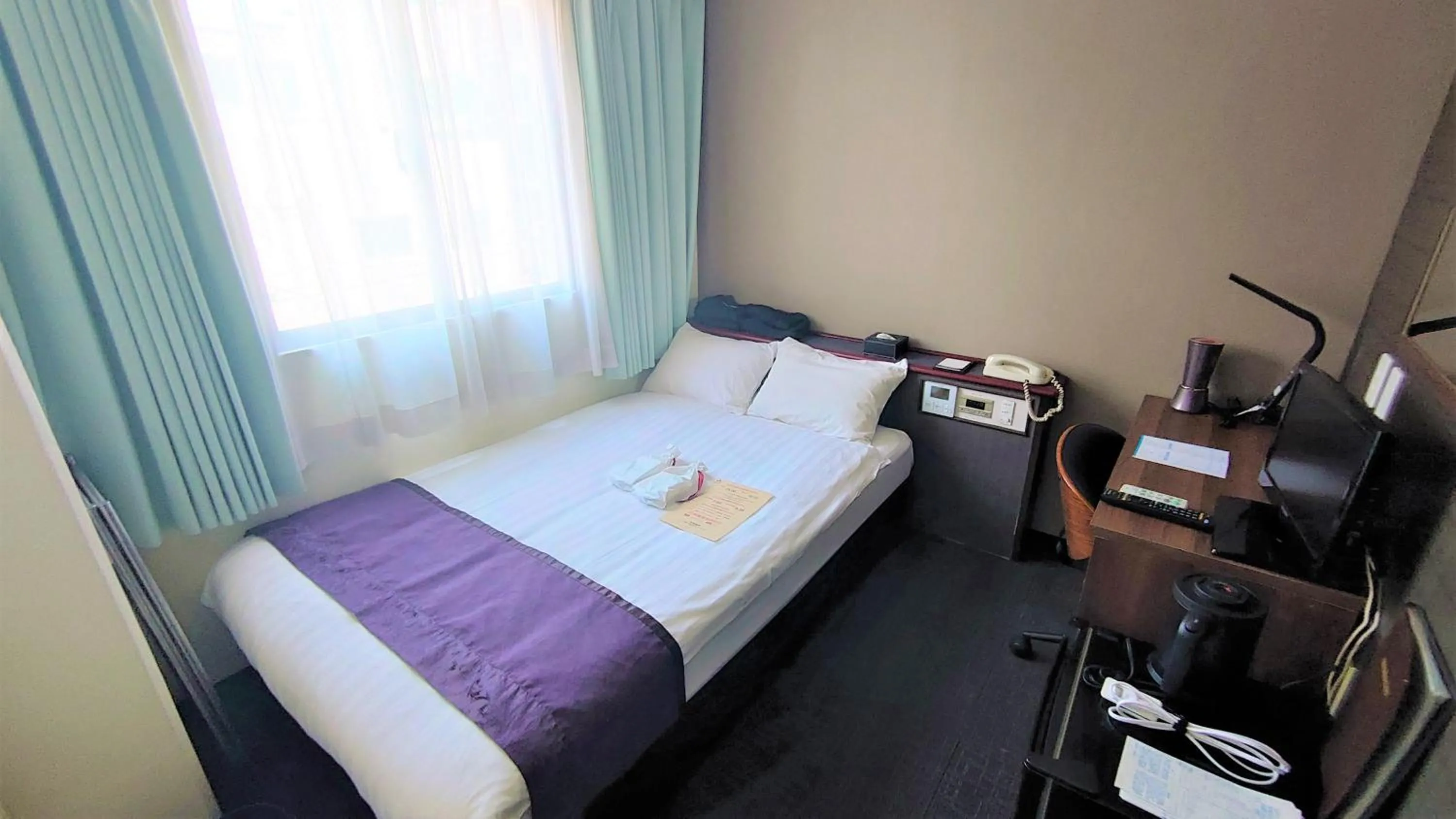 Bed in Hotel Area One Oita