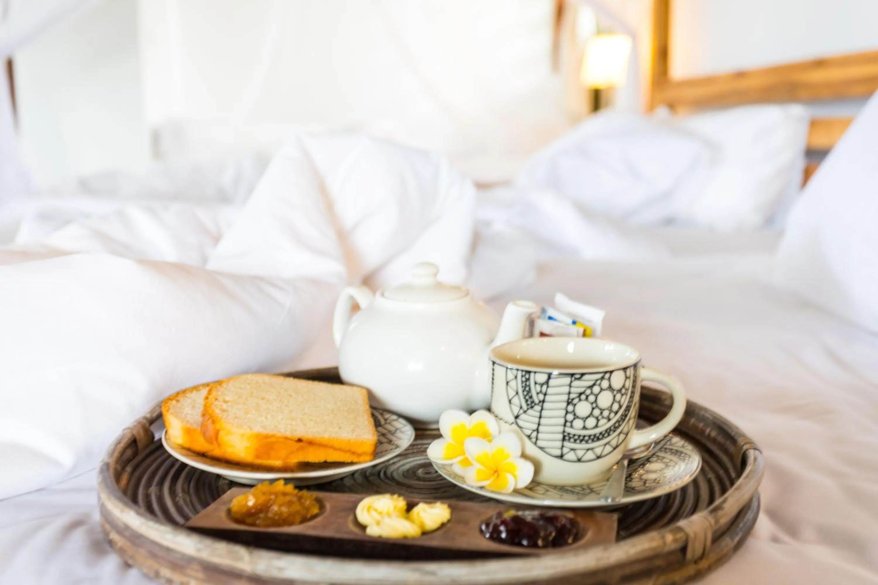 Bed in De Ubud Villas & Spa