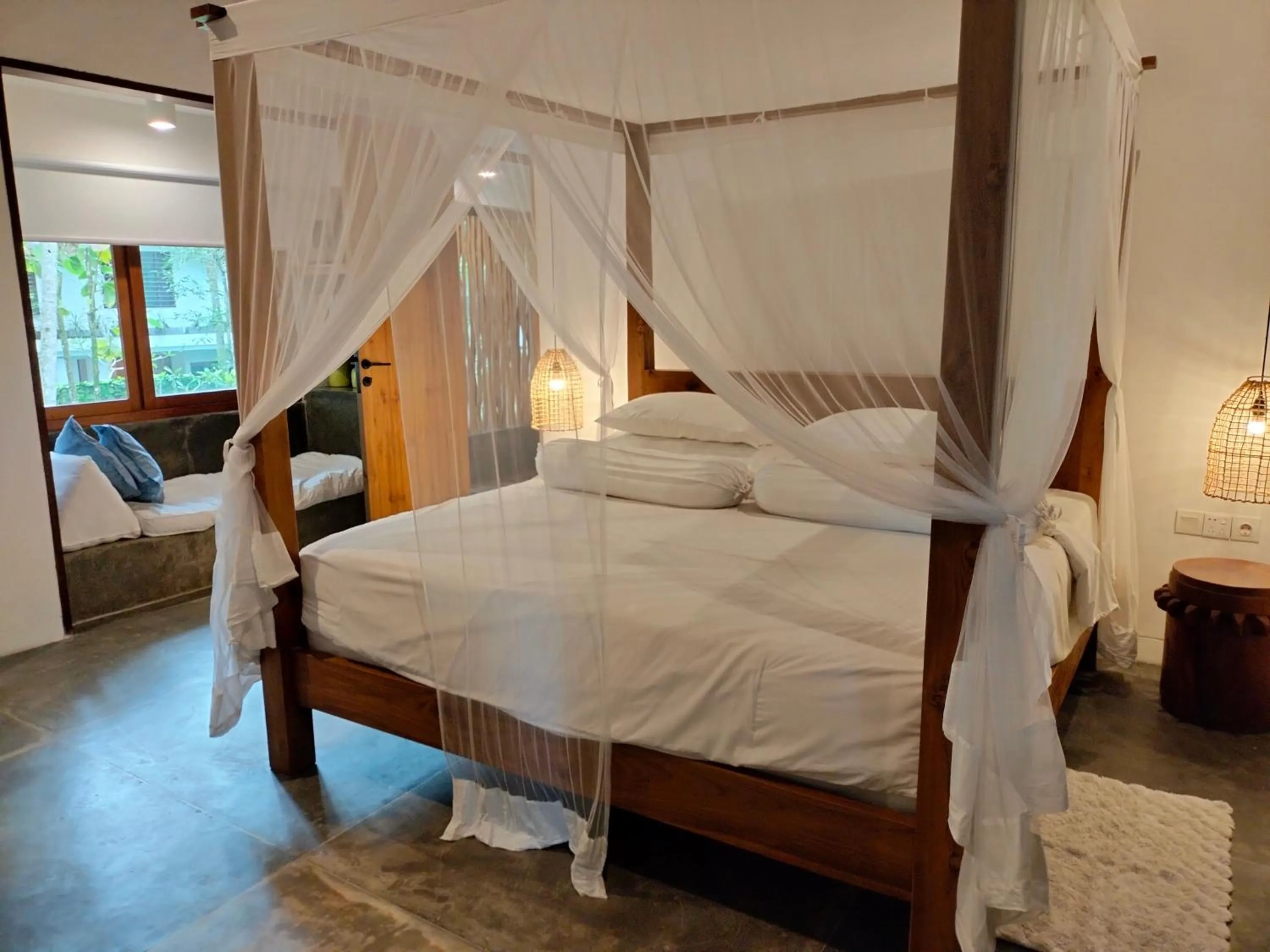 Bed in De Ubud Villas & Spa