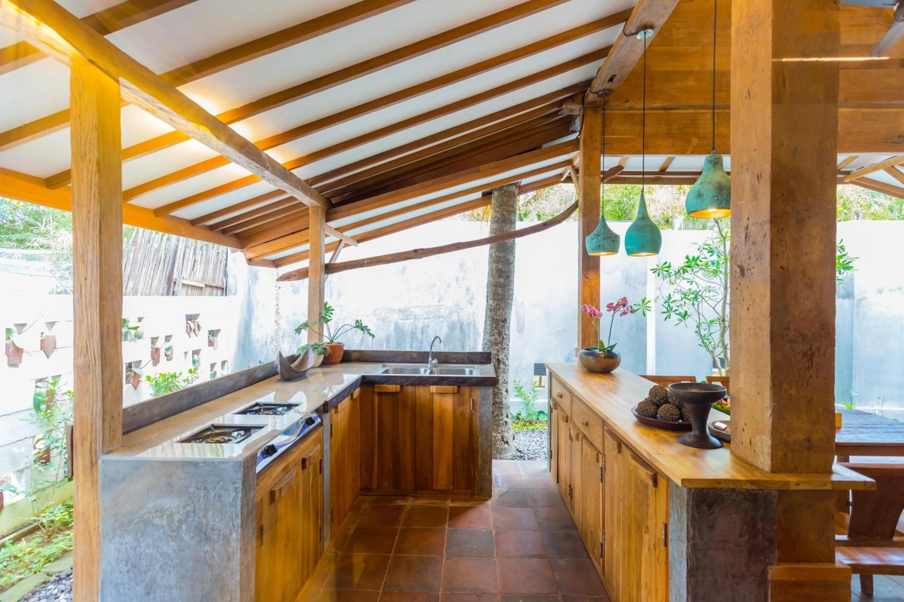 Kitchen or kitchenette in De Ubud Villas & Spa