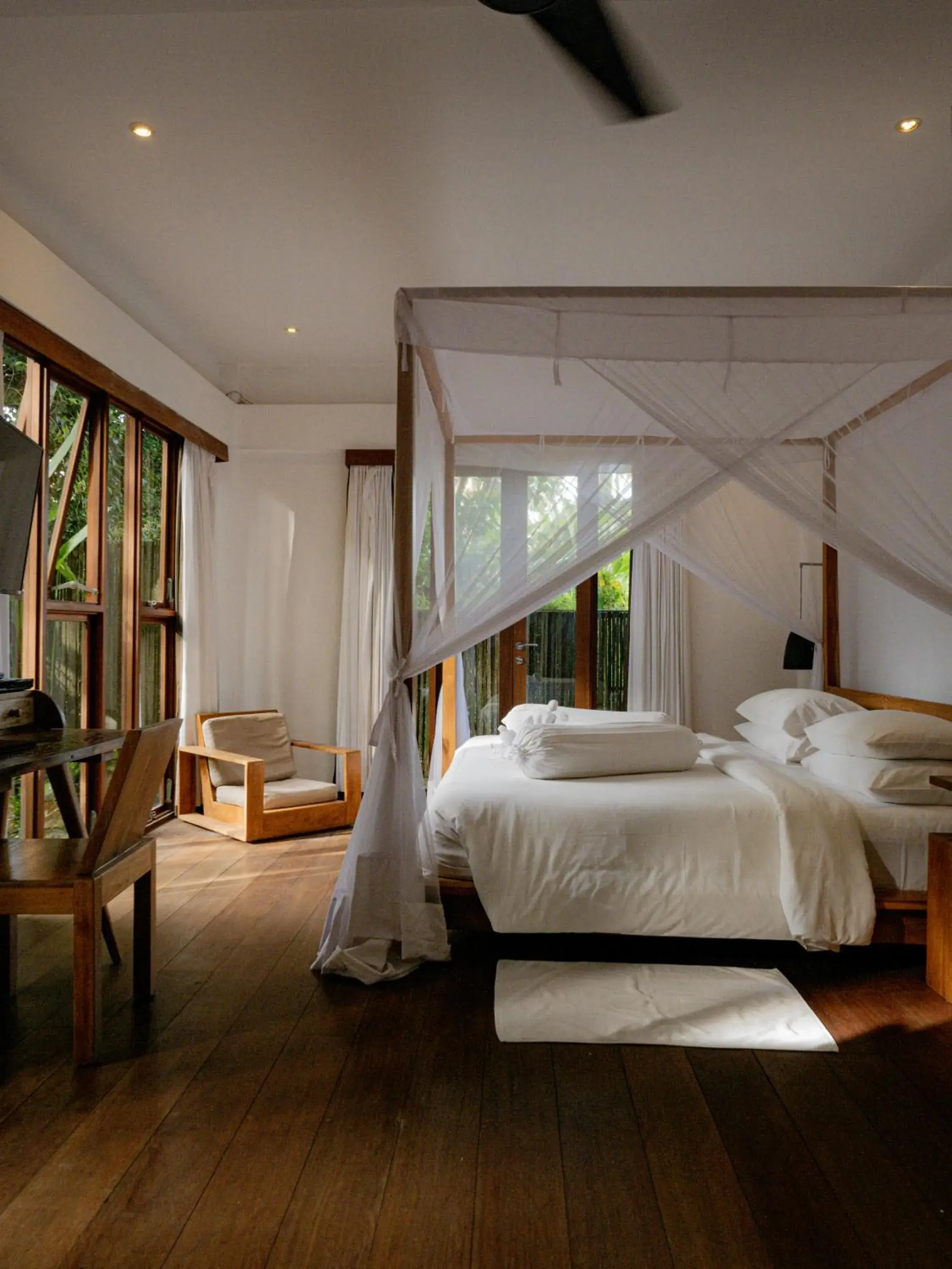 Bed in De Ubud Villas & Spa Bed in De Ubud Villas & Spa