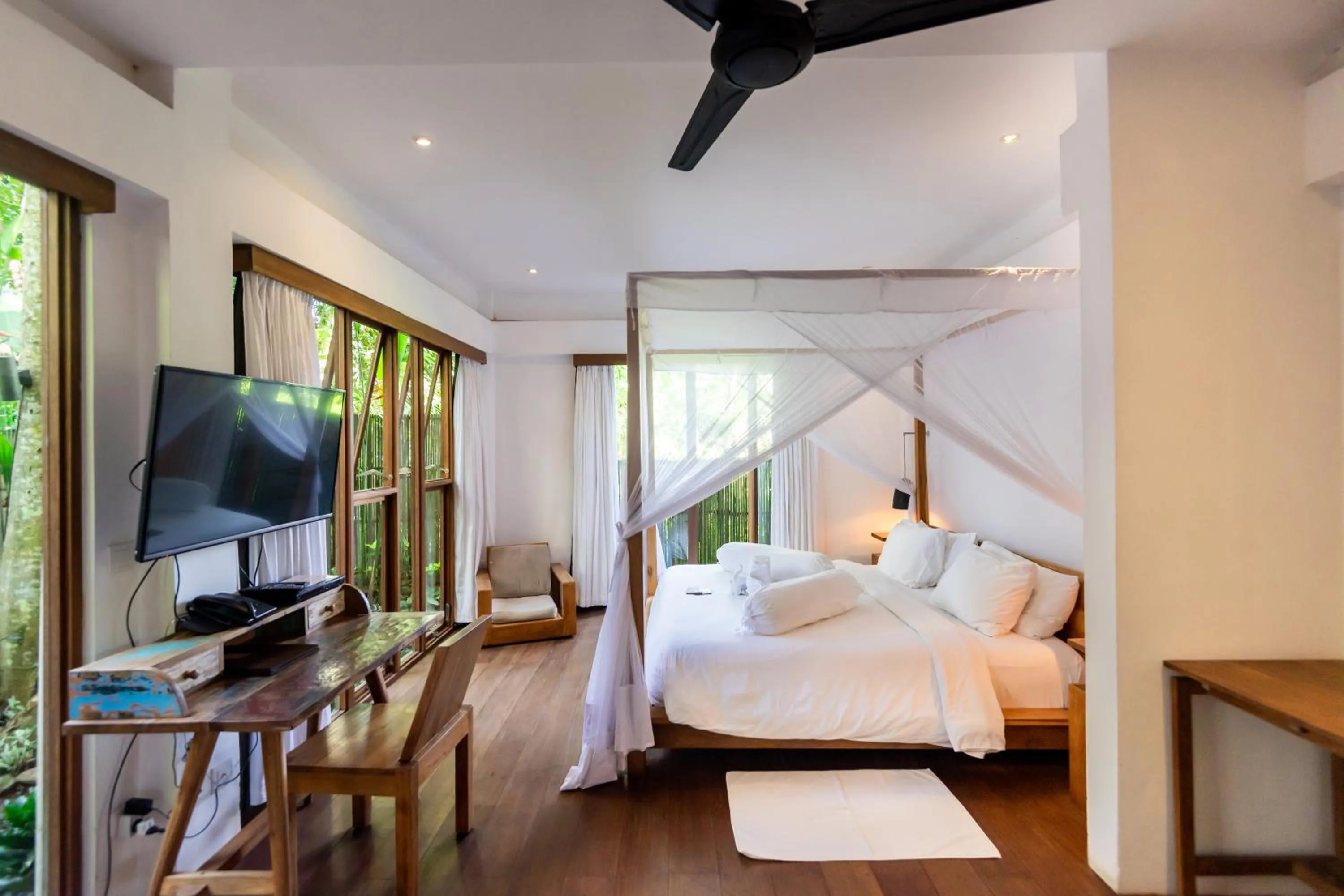 Bed in De Ubud Villas & Spa