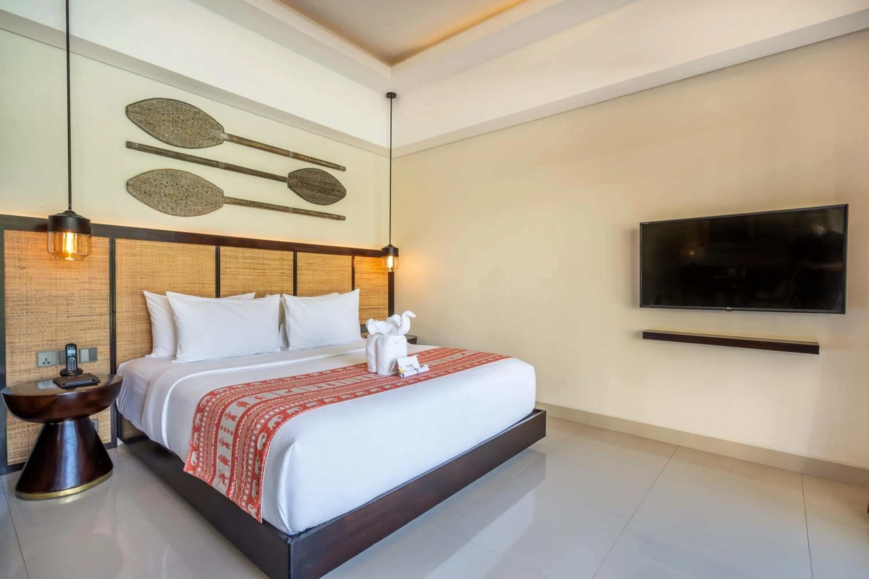 Bed in Sanctoo Suites & Villas