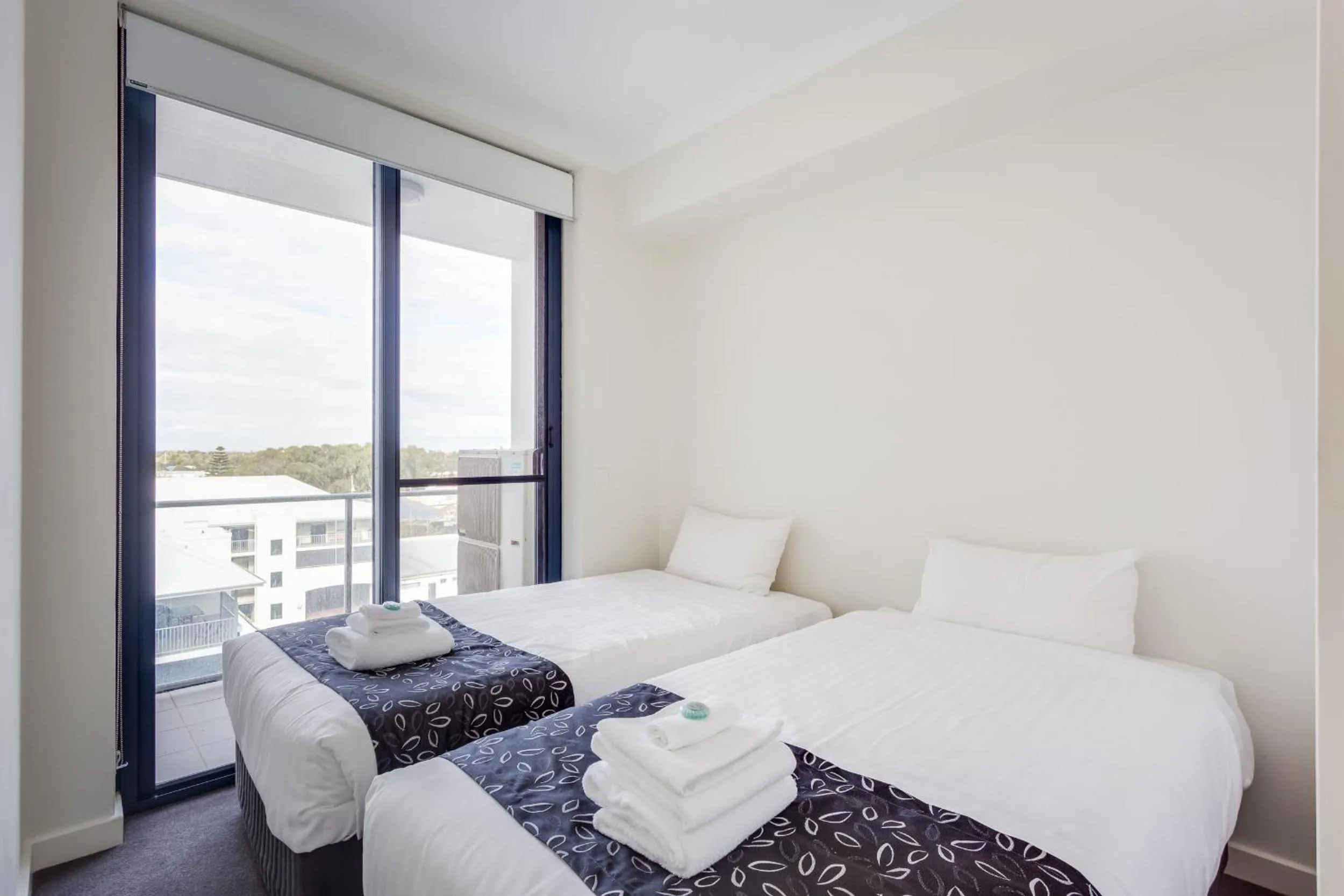 Day, Bed in Nautilus by Rockingham Apartments