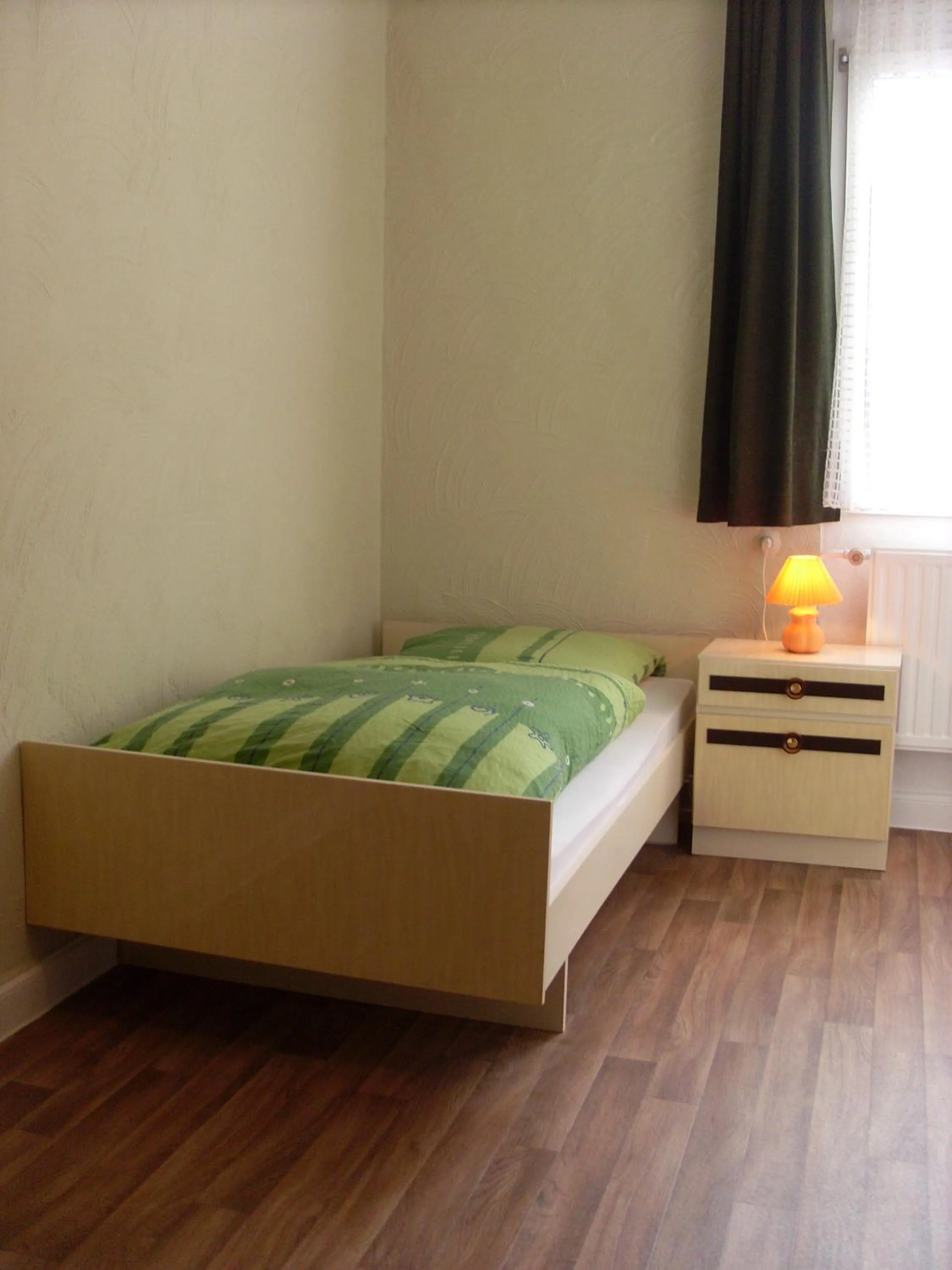 Photo of the whole room, Bed in Gästehaus Viktoria
