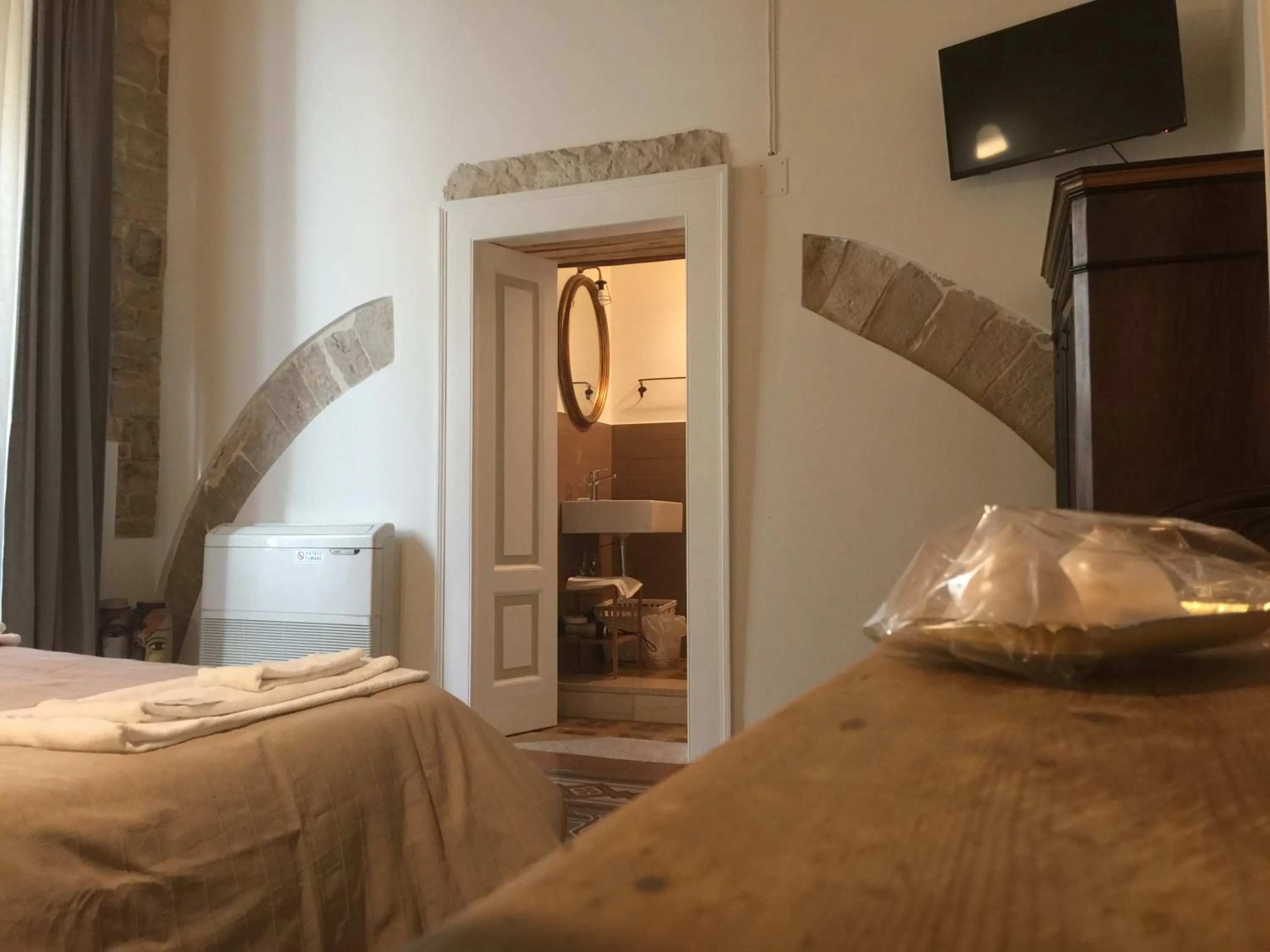 Bed in Palazzo Lupicini Affittacamere