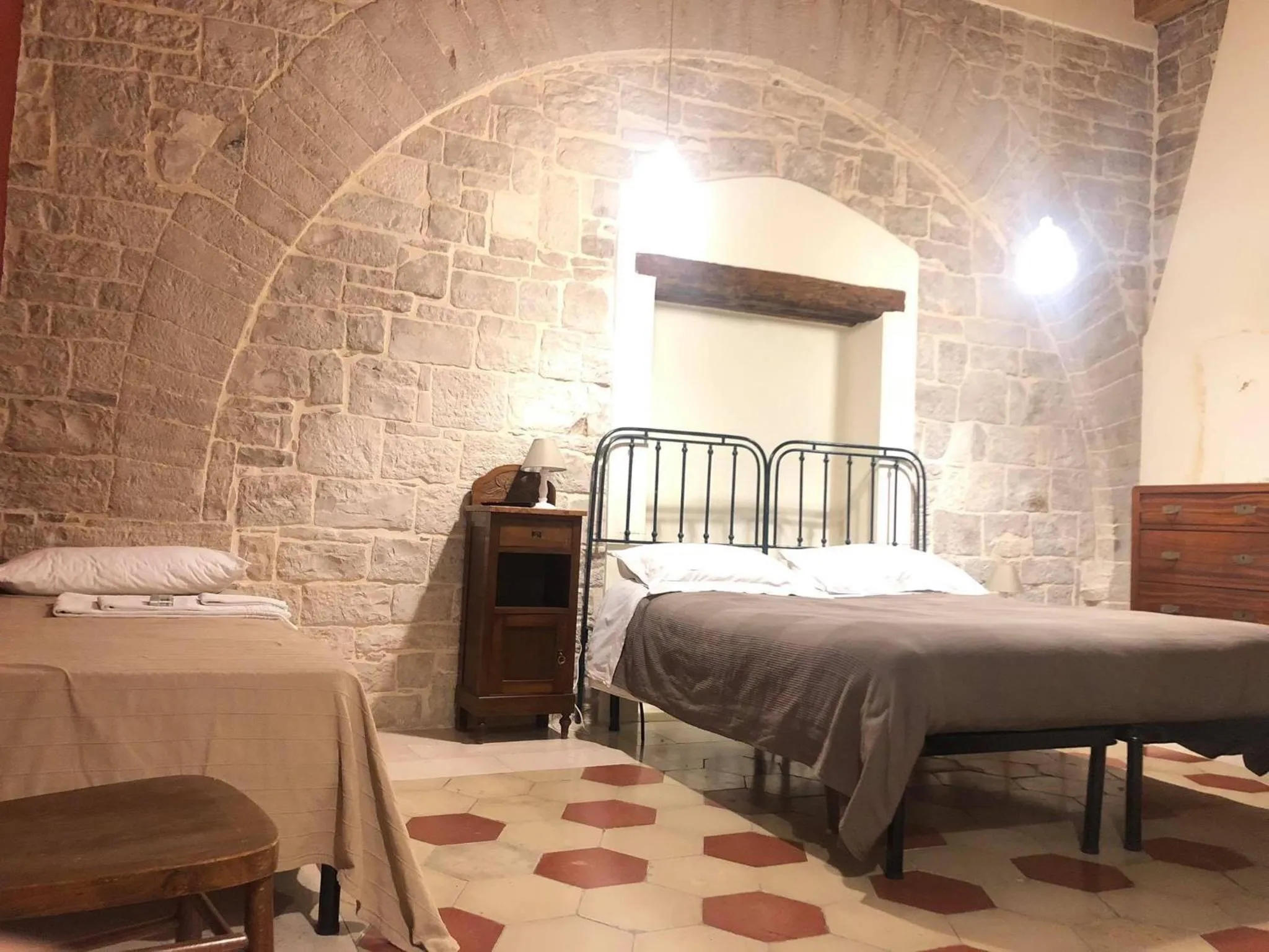 Bed in Palazzo Lupicini Affittacamere