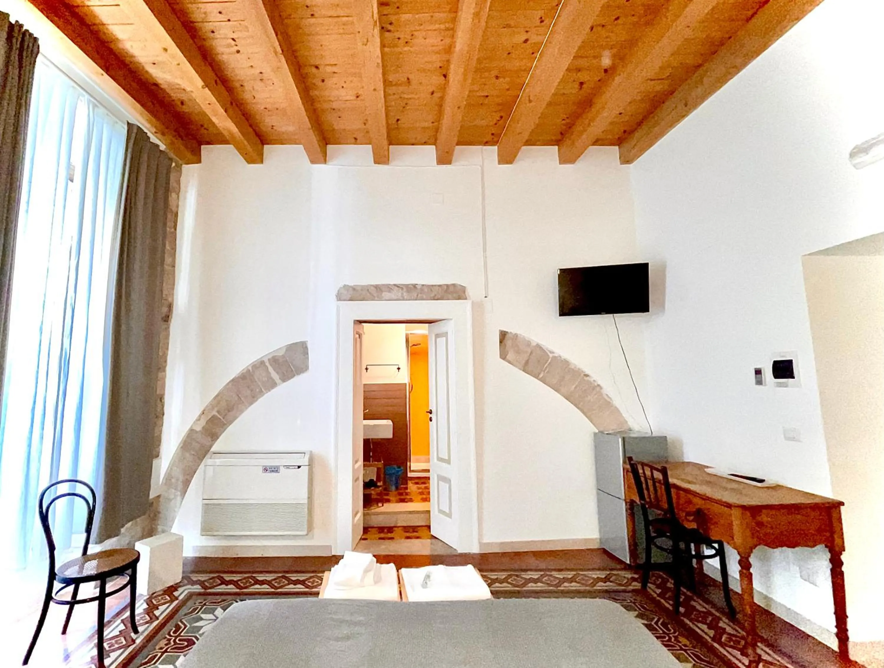 Bed in Palazzo Lupicini Affittacamere