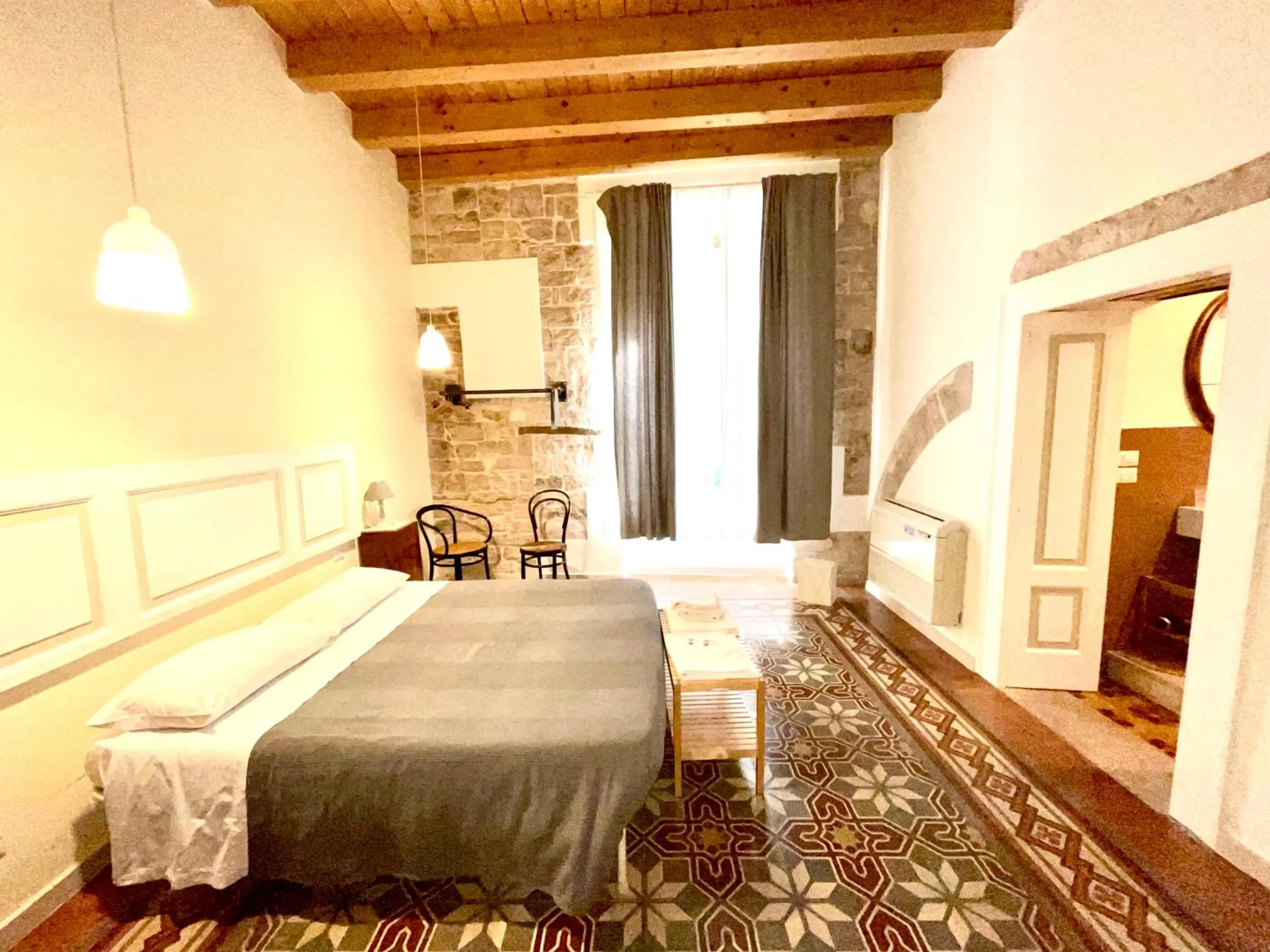 Bed in Palazzo Lupicini Affittacamere
