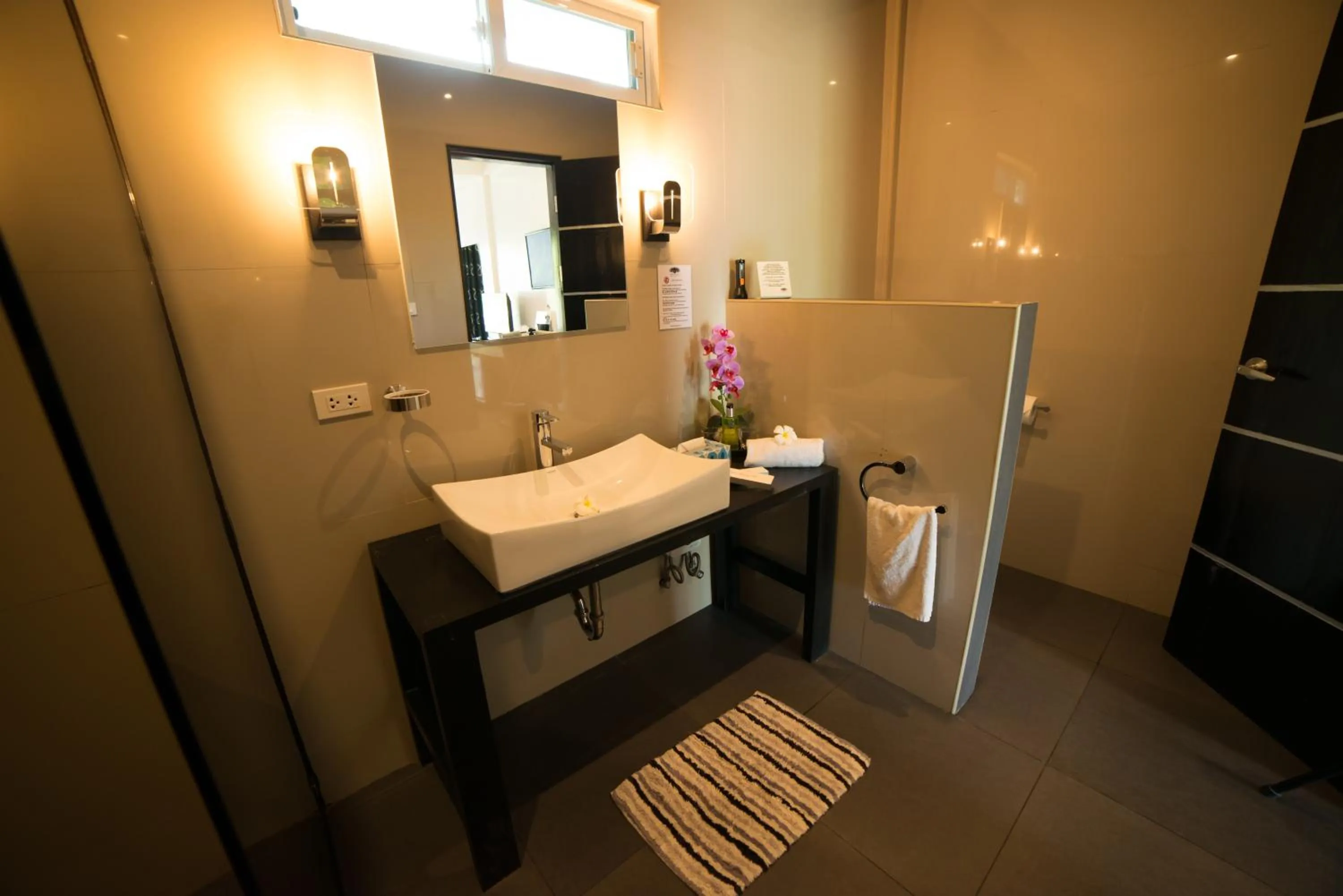 Bathroom in Alona Royal Palm Resort