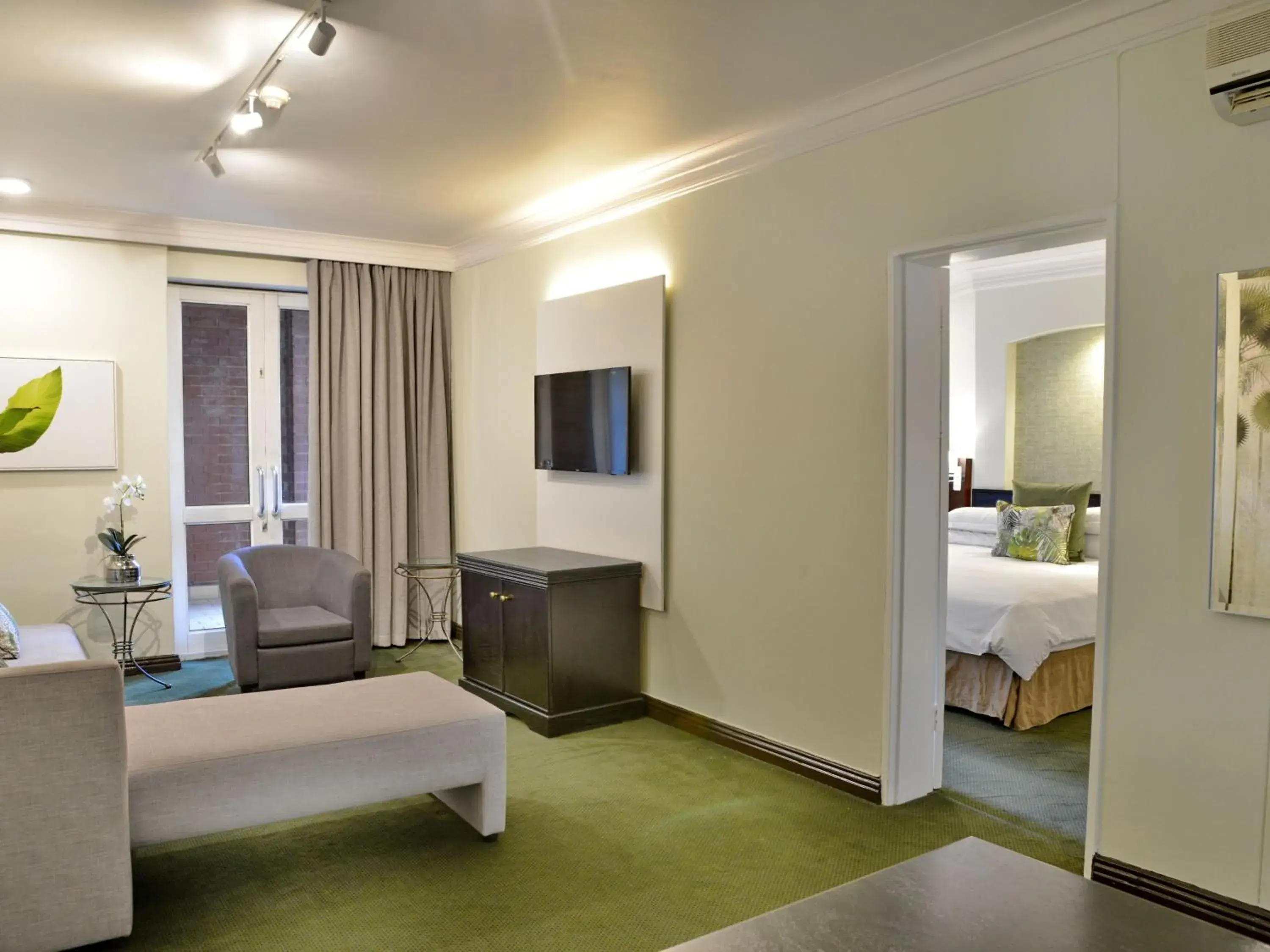 Living room, Bed in ANEW Hotel Centurion Pretoria Living room, Bed in ANEW Hotel Centurion Pretoria