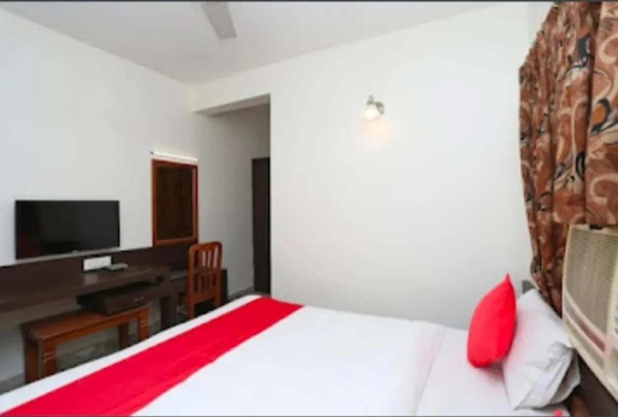 Bed in Hotel Vijay Palace