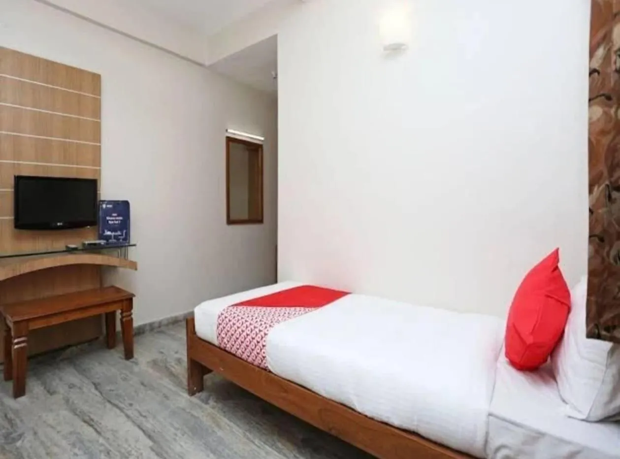 Bed in Hotel Vijay Palace