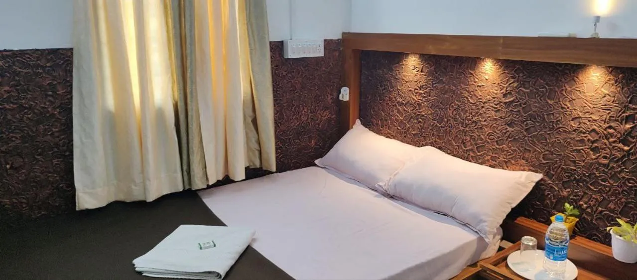 Bed in Kalappura Homestay