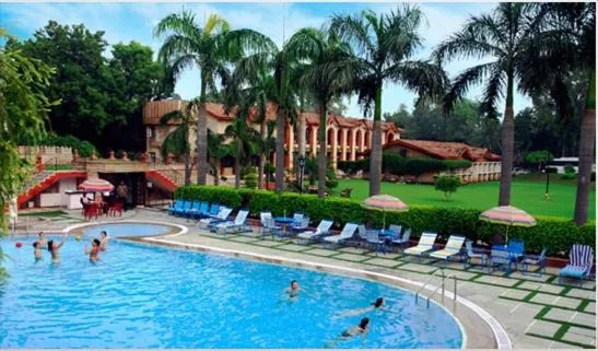 Swimming pool in Ashok Country Resort