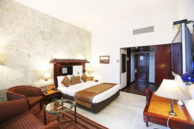 Deluxe Double Room (2 Adults + 1 Child) in Ashok Country Resort Deluxe Double Room (2 Adults + 1 Child) in Ashok Country Resort