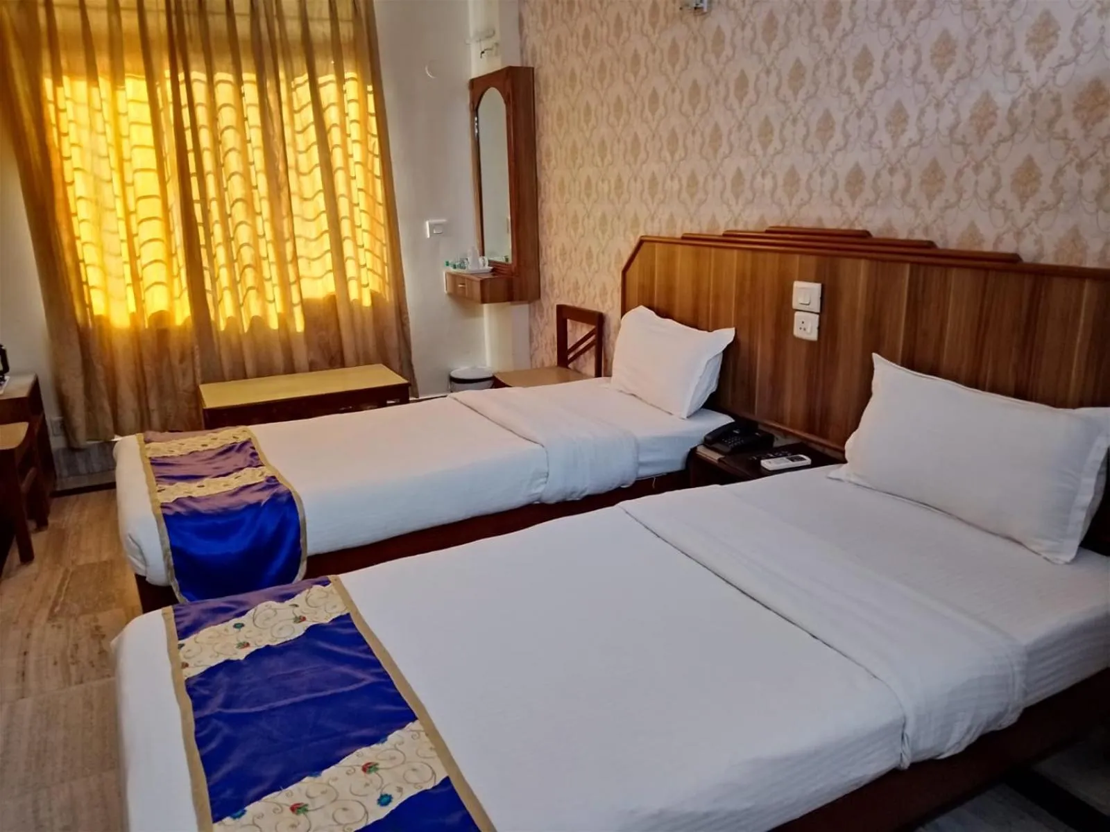 View (from property/room), Bed in Hotel Priya Palace