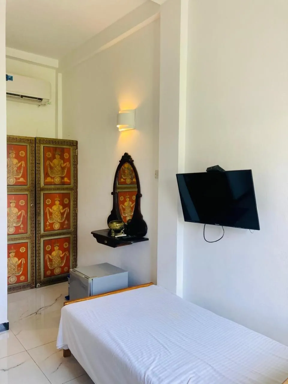 Bed in The Villa Hotel