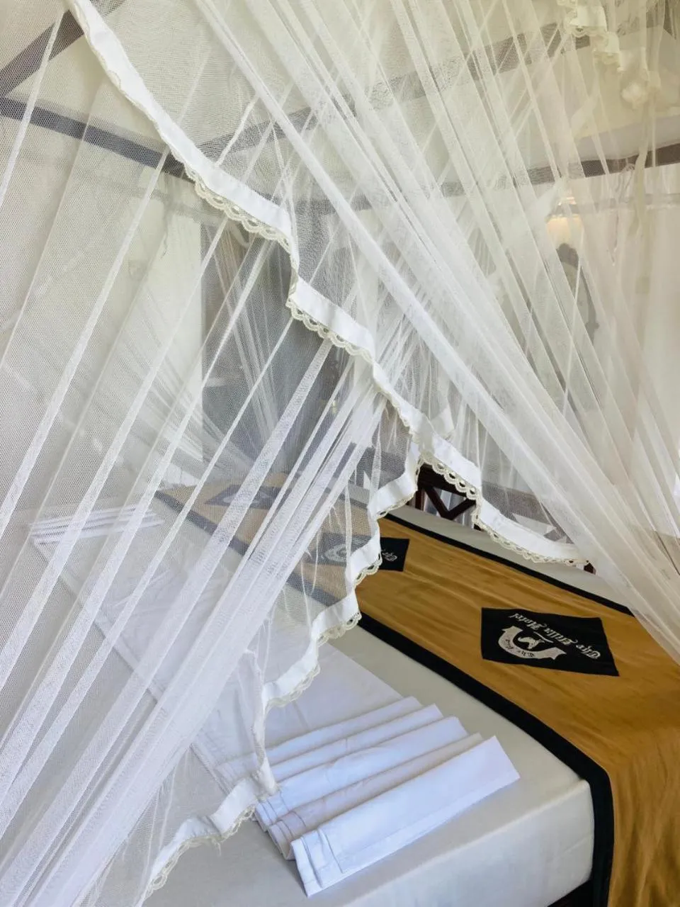 Bed in The Villa Hotel