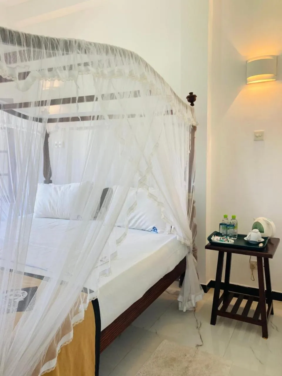 Bed in The Villa Hotel