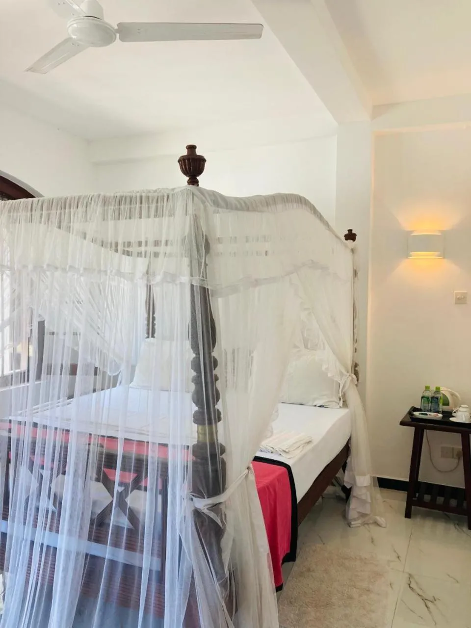 Bed in The Villa Hotel