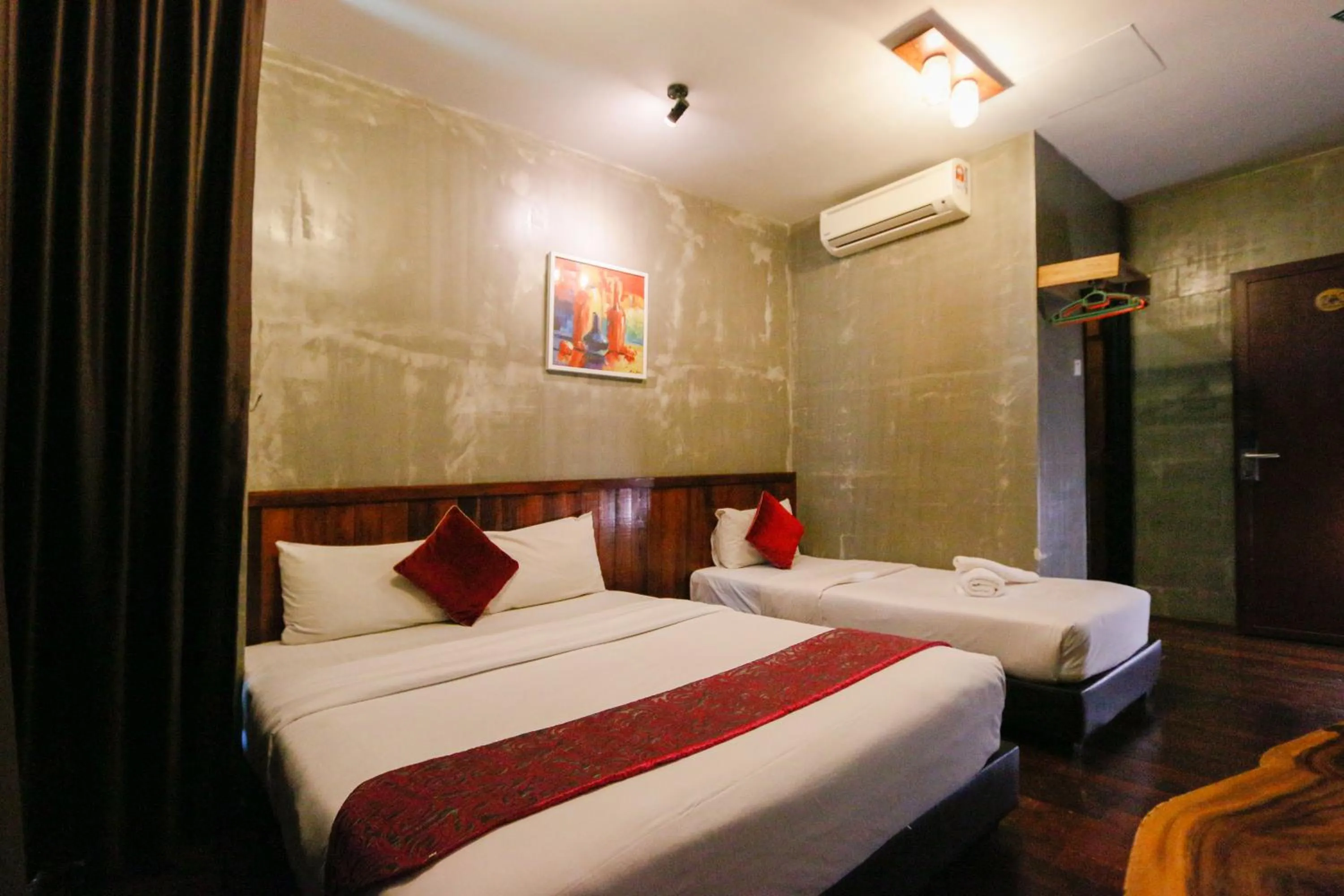Bed in Anggun Hotel