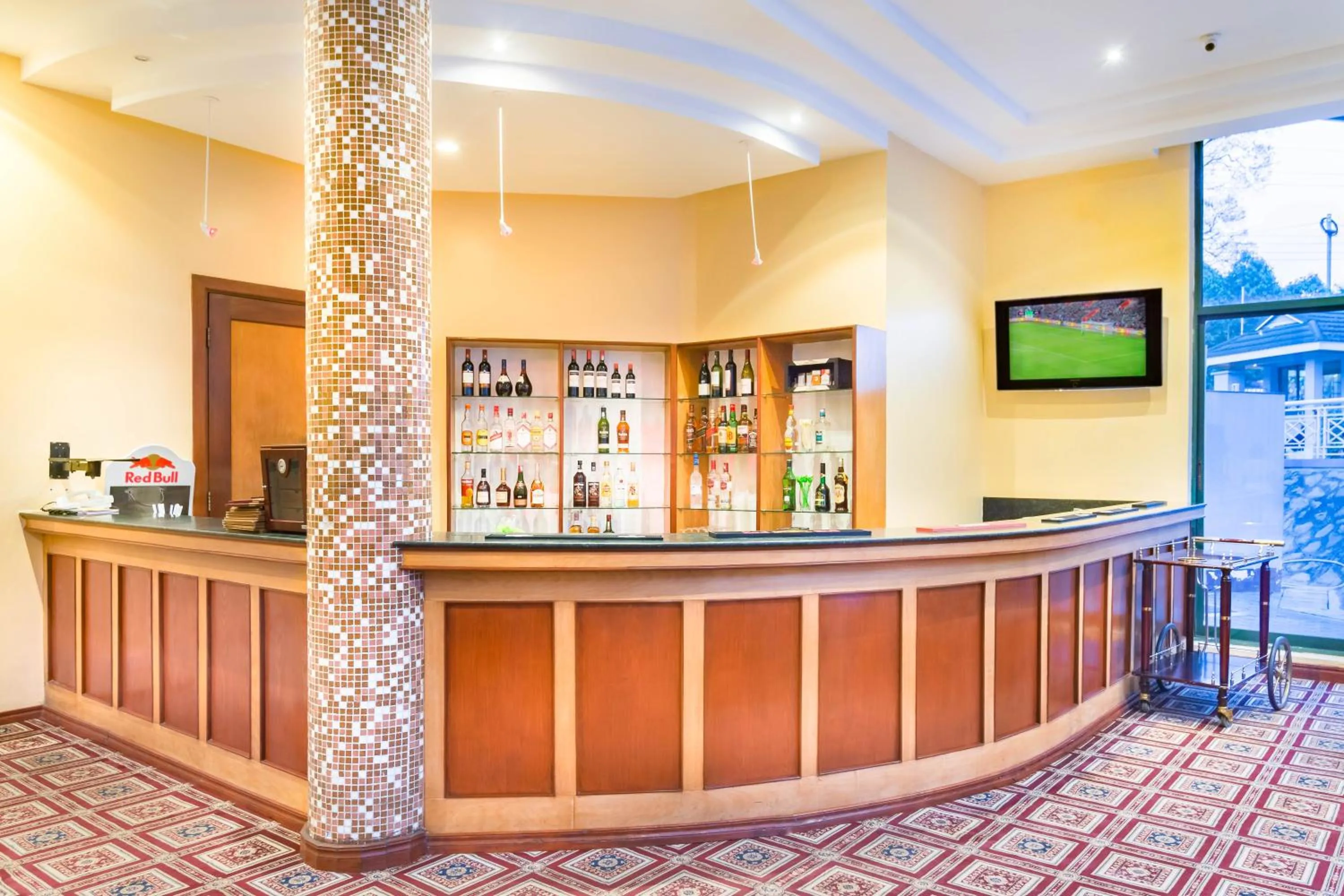 Lounge or bar in Gold Crest Hotel - Arusha