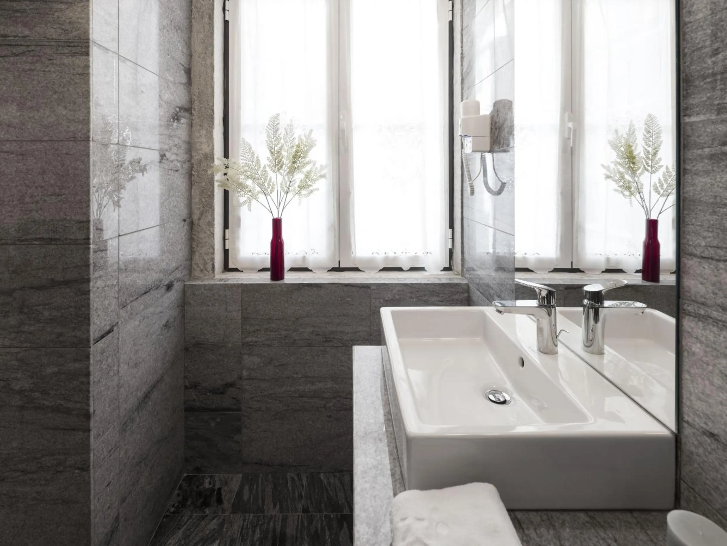 Bathroom in LSA Baixa Castelo by Numa