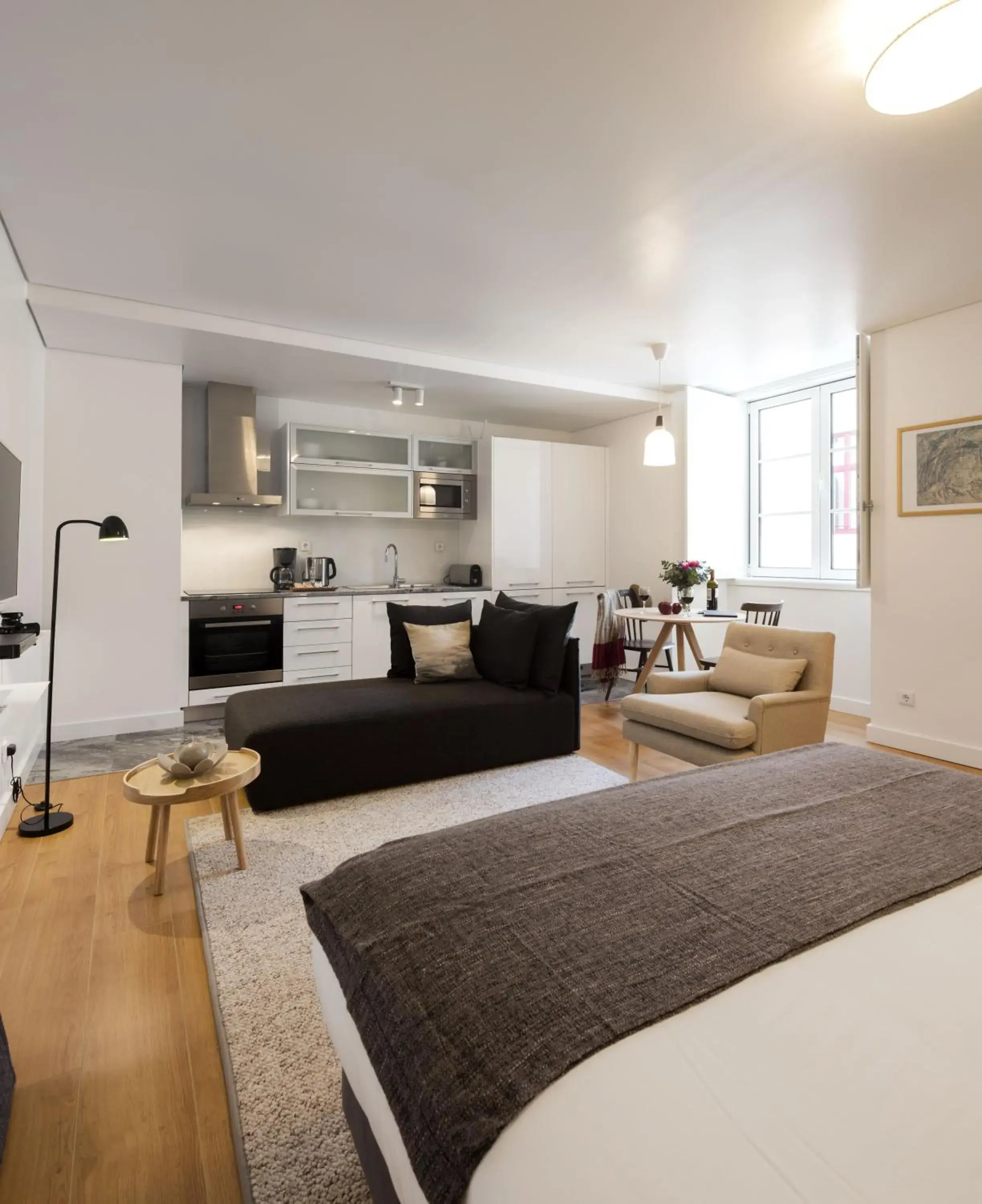 Living room, Bed in Lisbon Serviced Apartments - Baixa Castelo Living room, Bed in Lisbon Serviced Apartments - Baixa Castelo