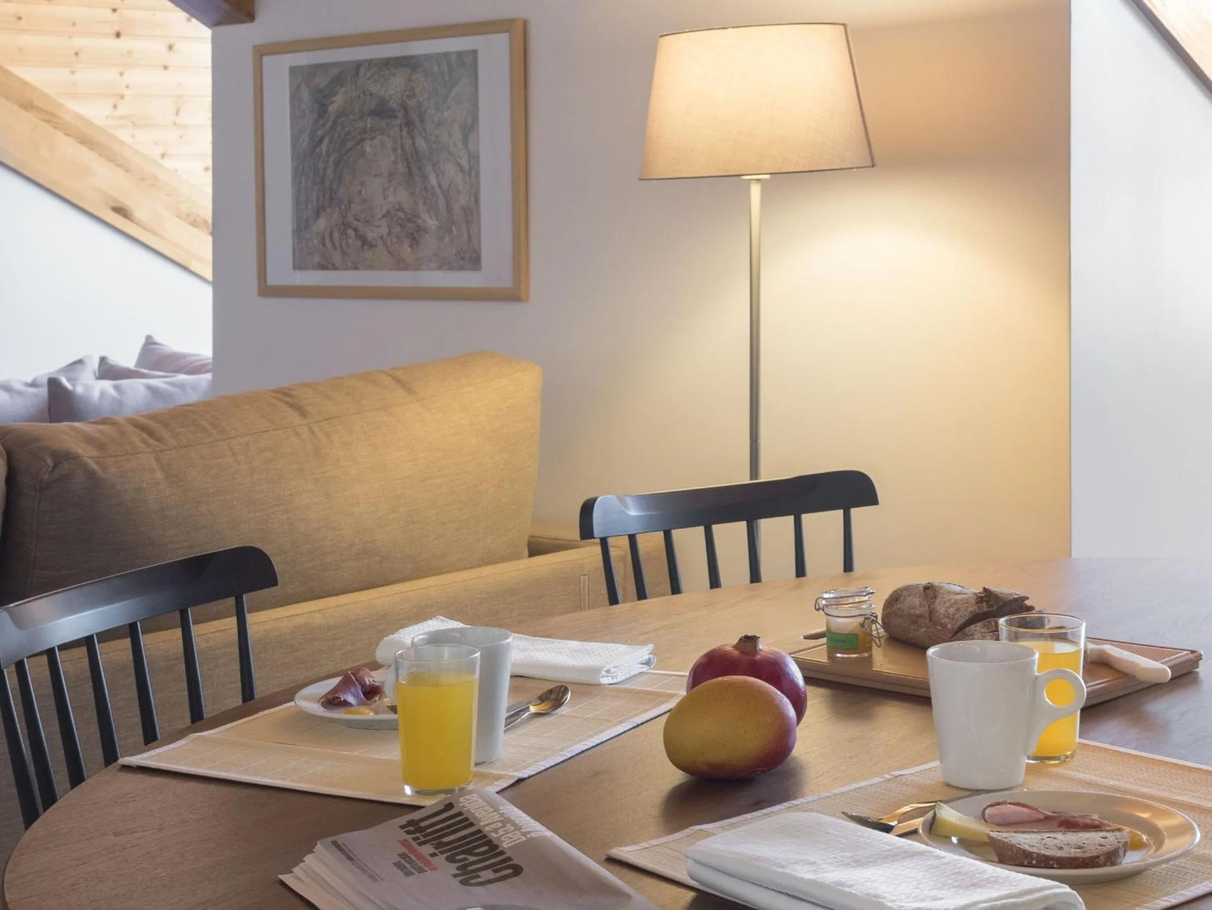 Dining area in LSA Baixa Castelo by Numa
