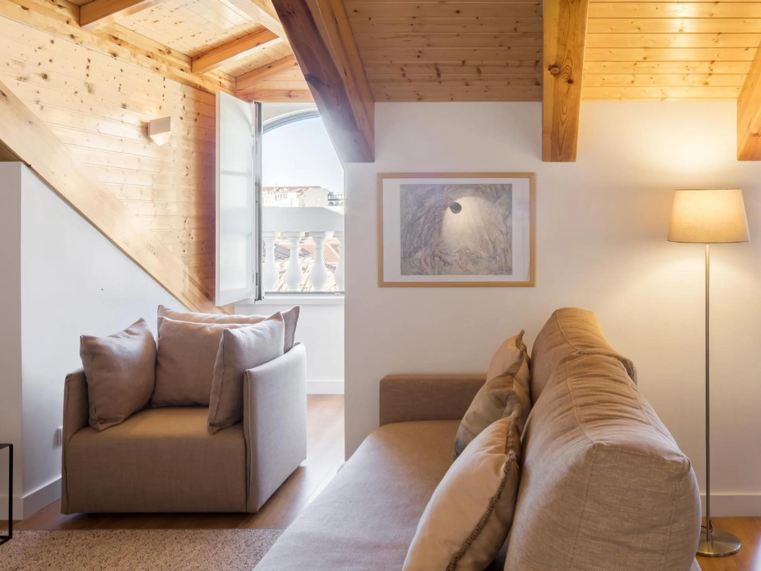 Seating area in LSA Baixa Castelo by Numa