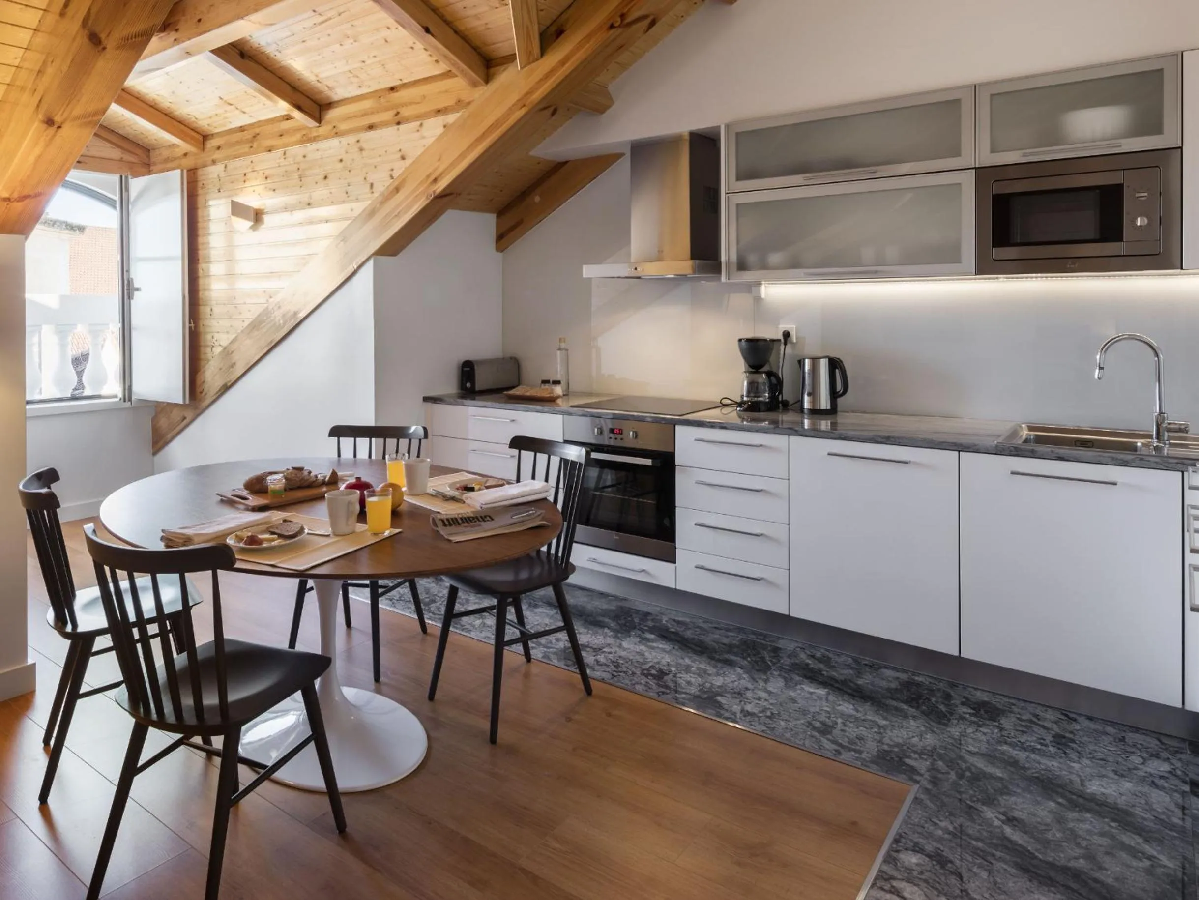 Kitchen or kitchenette in LSA Baixa Castelo by Numa