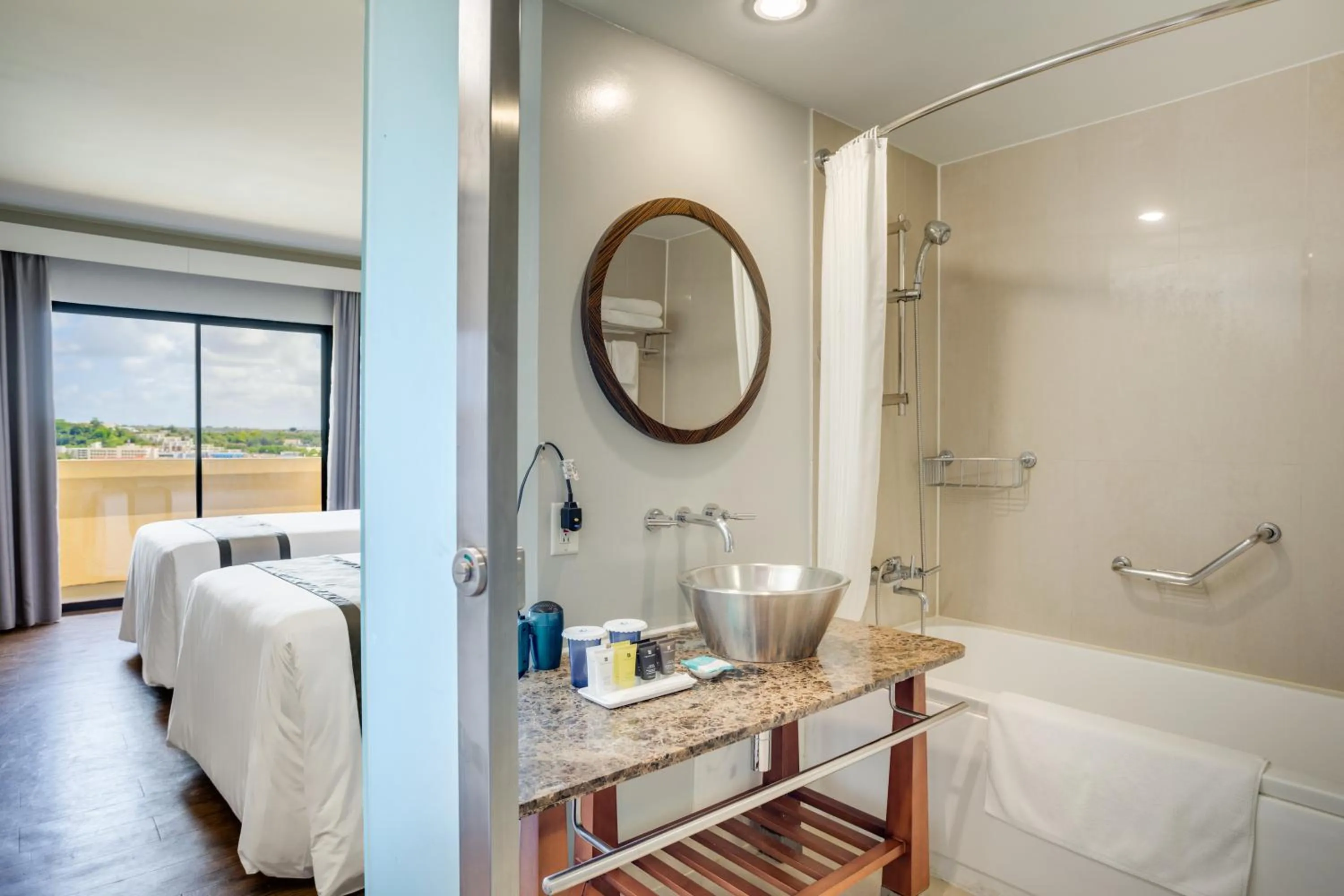 Bathroom, Bed in Guam Plaza Resort
