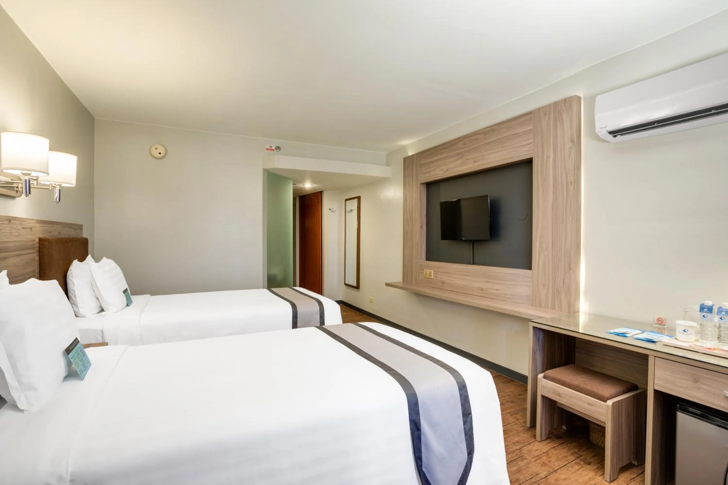 Bed in Guam Plaza Resort