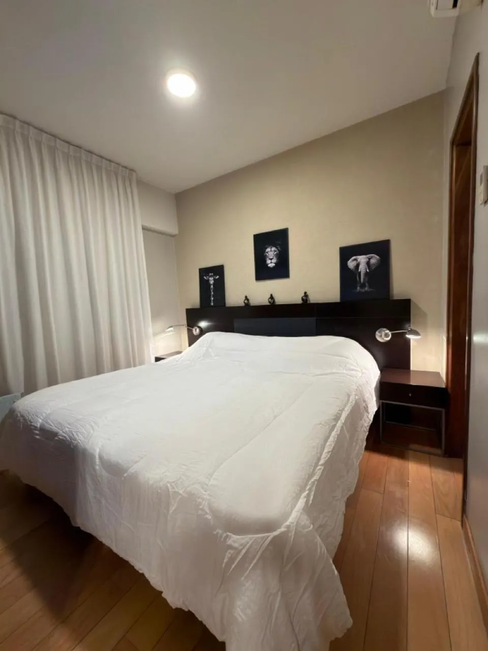 Bed in Del Bono Suites