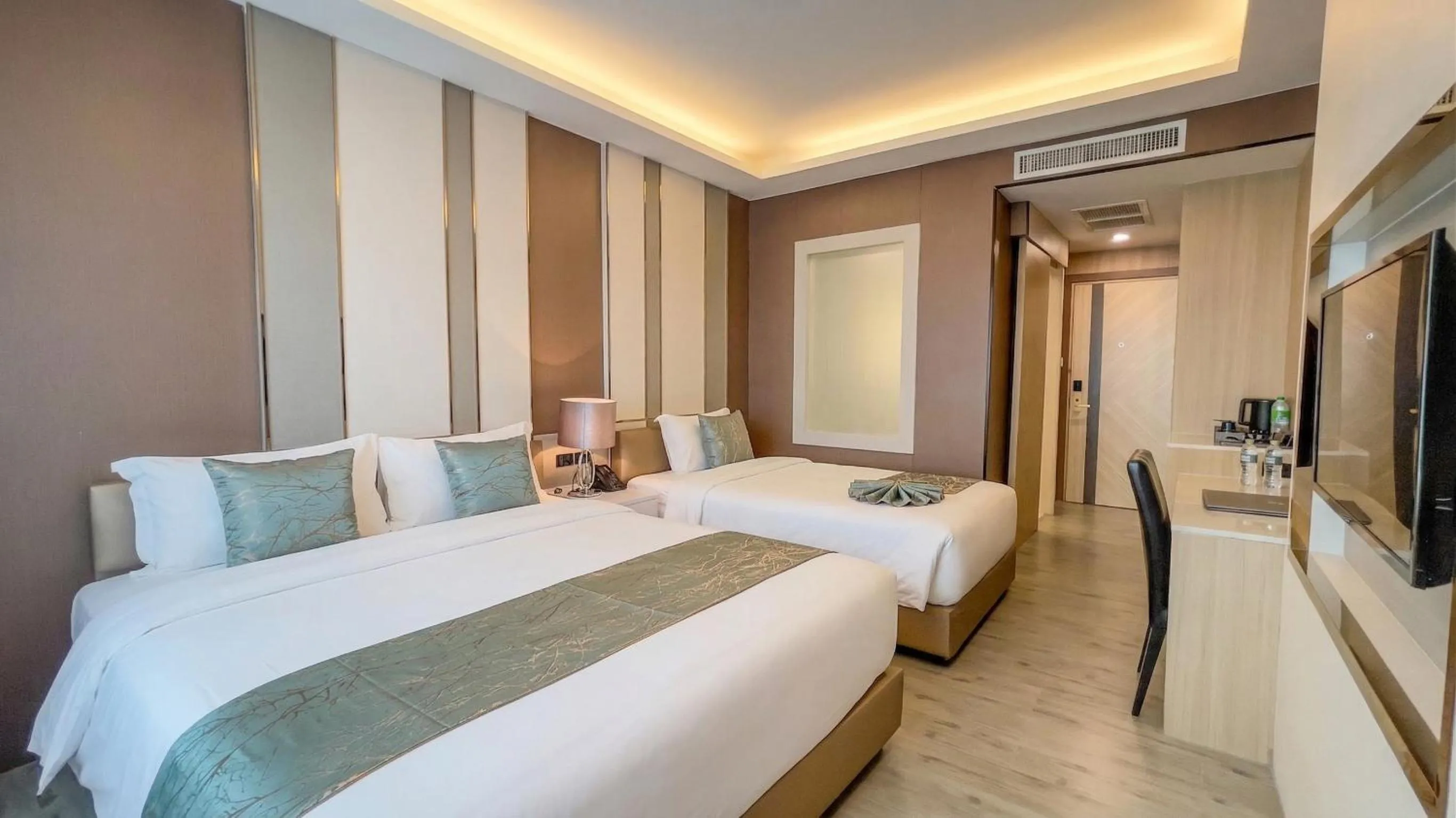 Deluxe Triple Room in Enrich Grand Hotel