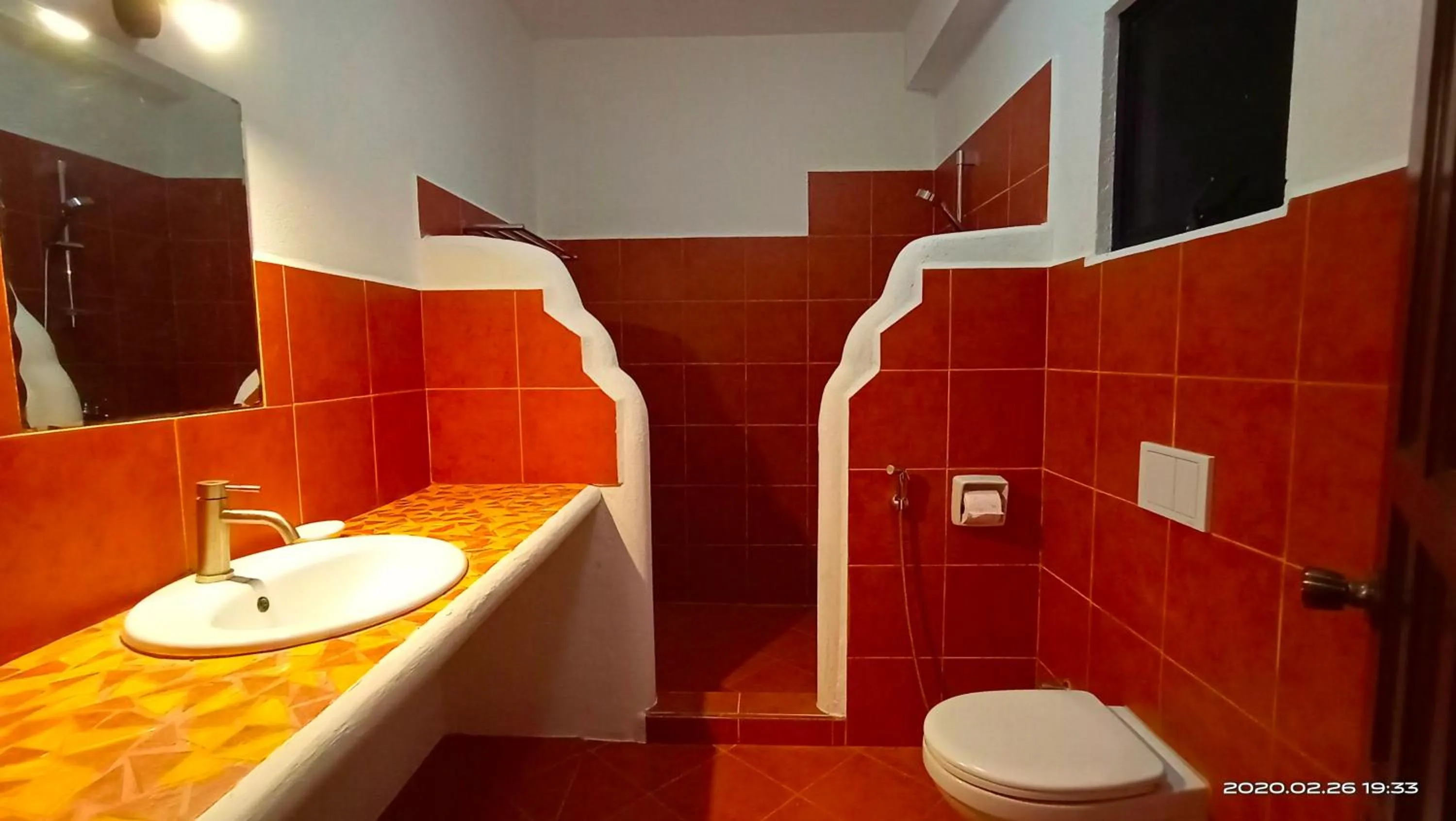 Shower in Aquarius Terraces Boutique Resort