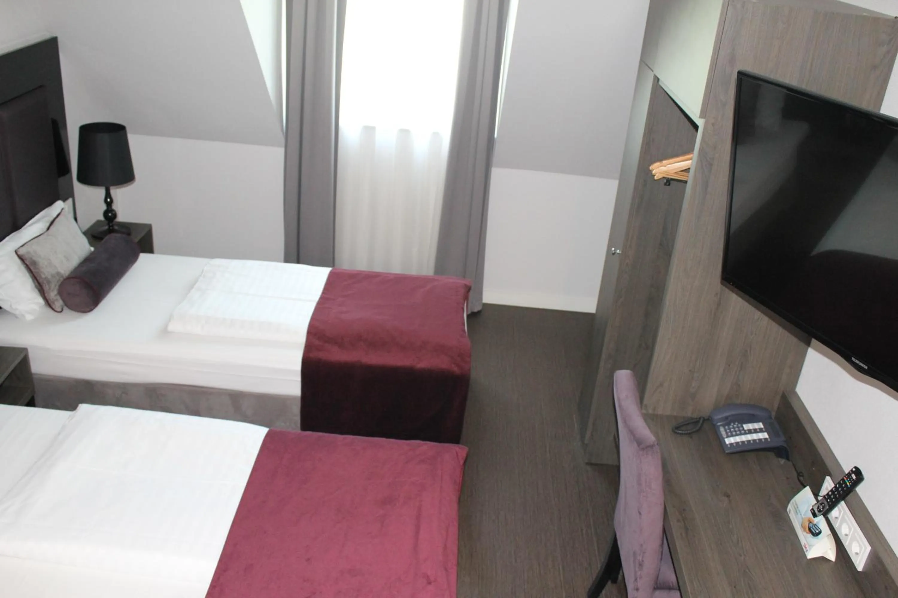 Photo of the whole room, Bed in Fair Hotel Europaallee