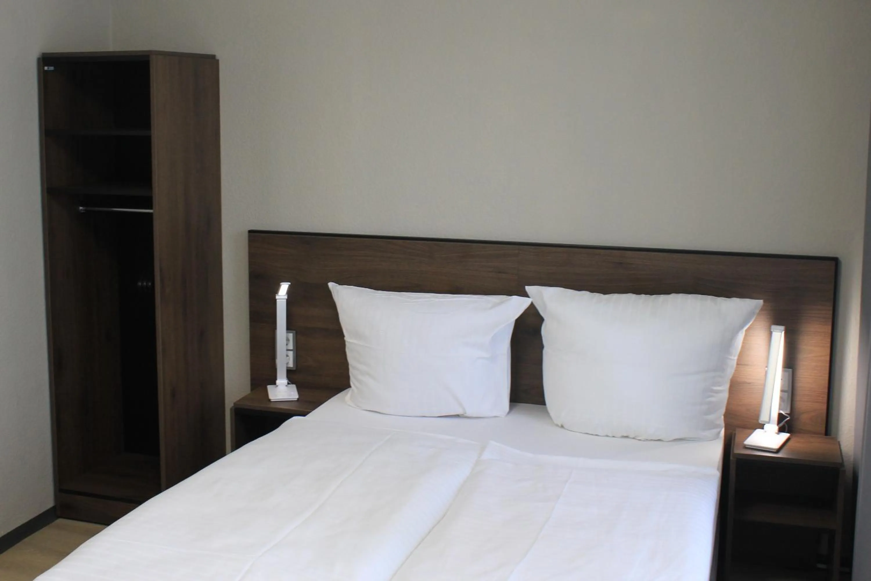 Photo of the whole room, Bed in Fair Hotel Europaallee
