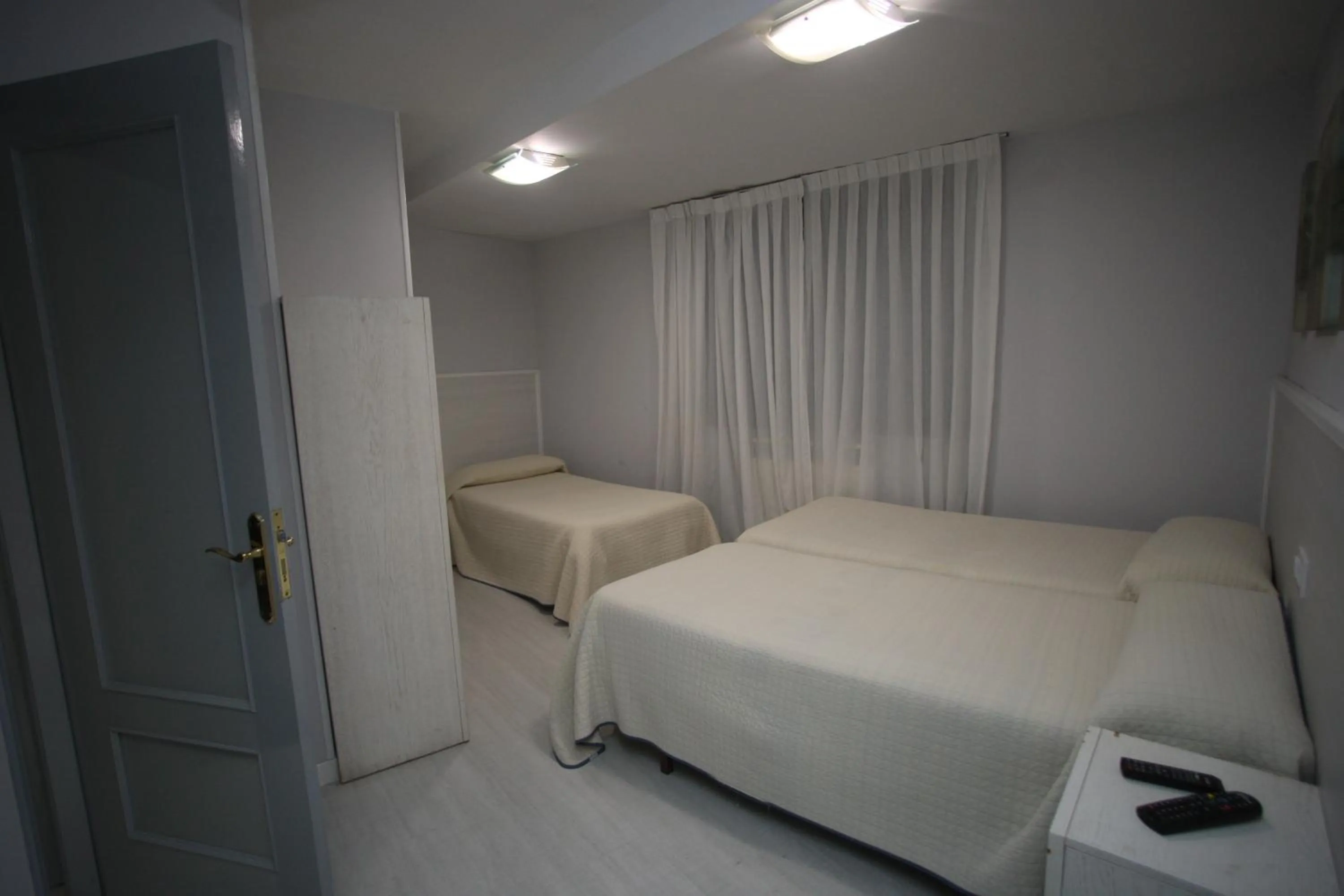 Photo of the whole room, Bed in Hostal Santa Barbara